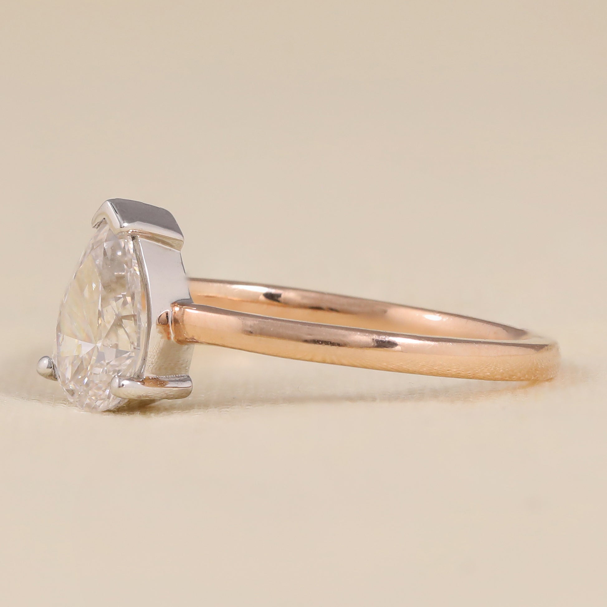 Modern engagement ring styled with pear lab grown diamond