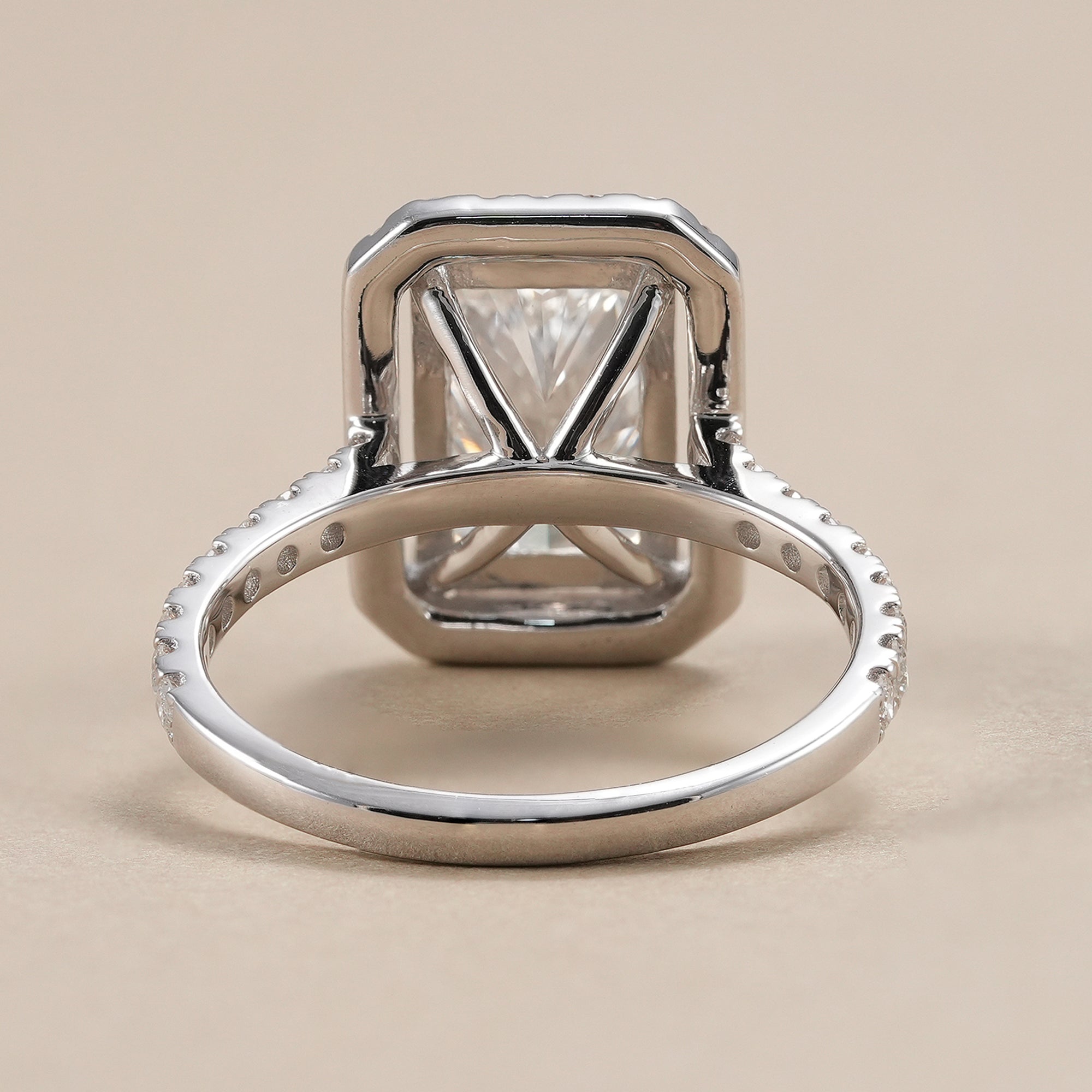 Luxury radiant lab diamond engagement ring with pavé diamonds.