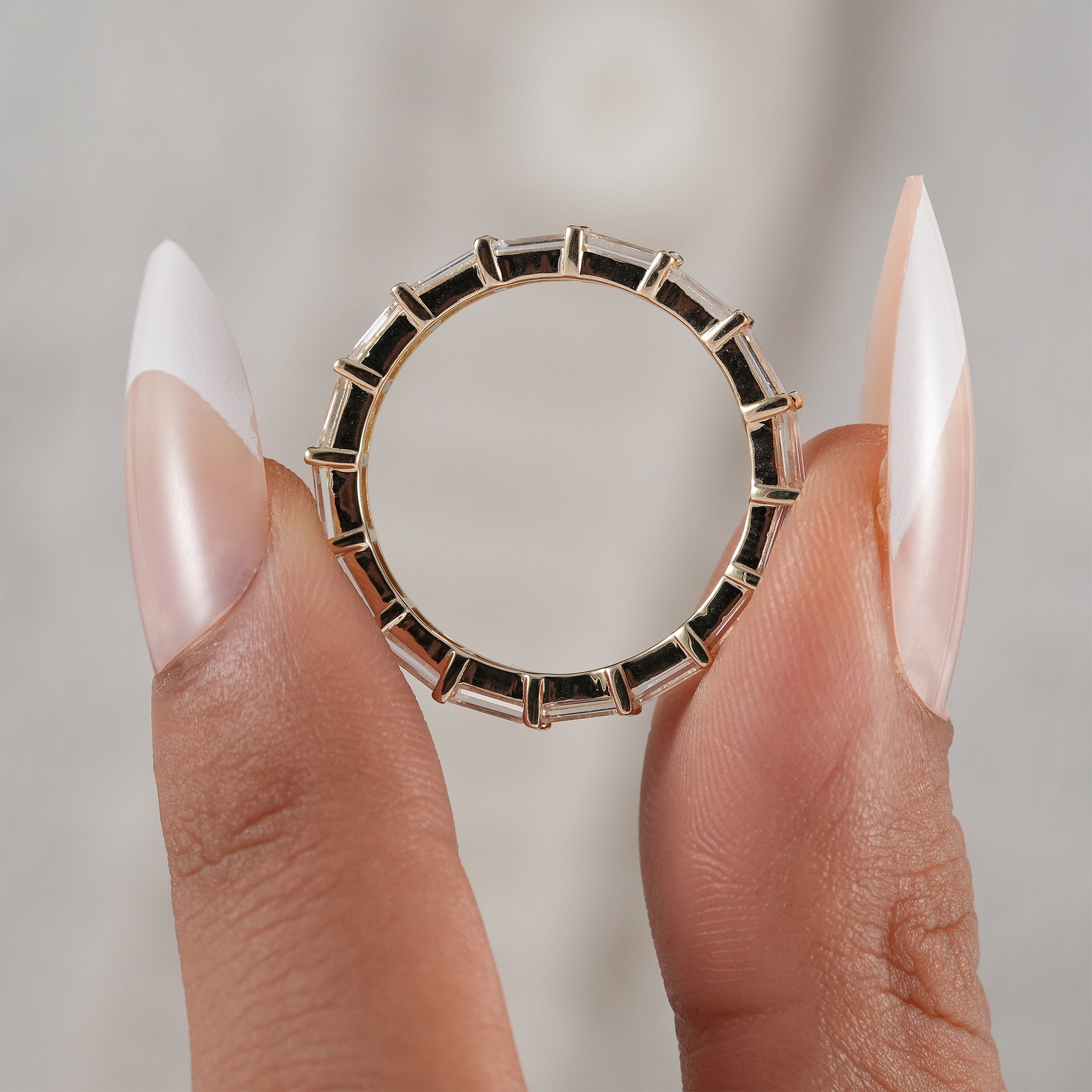 Handcrafted baguette eternity wedding band.
