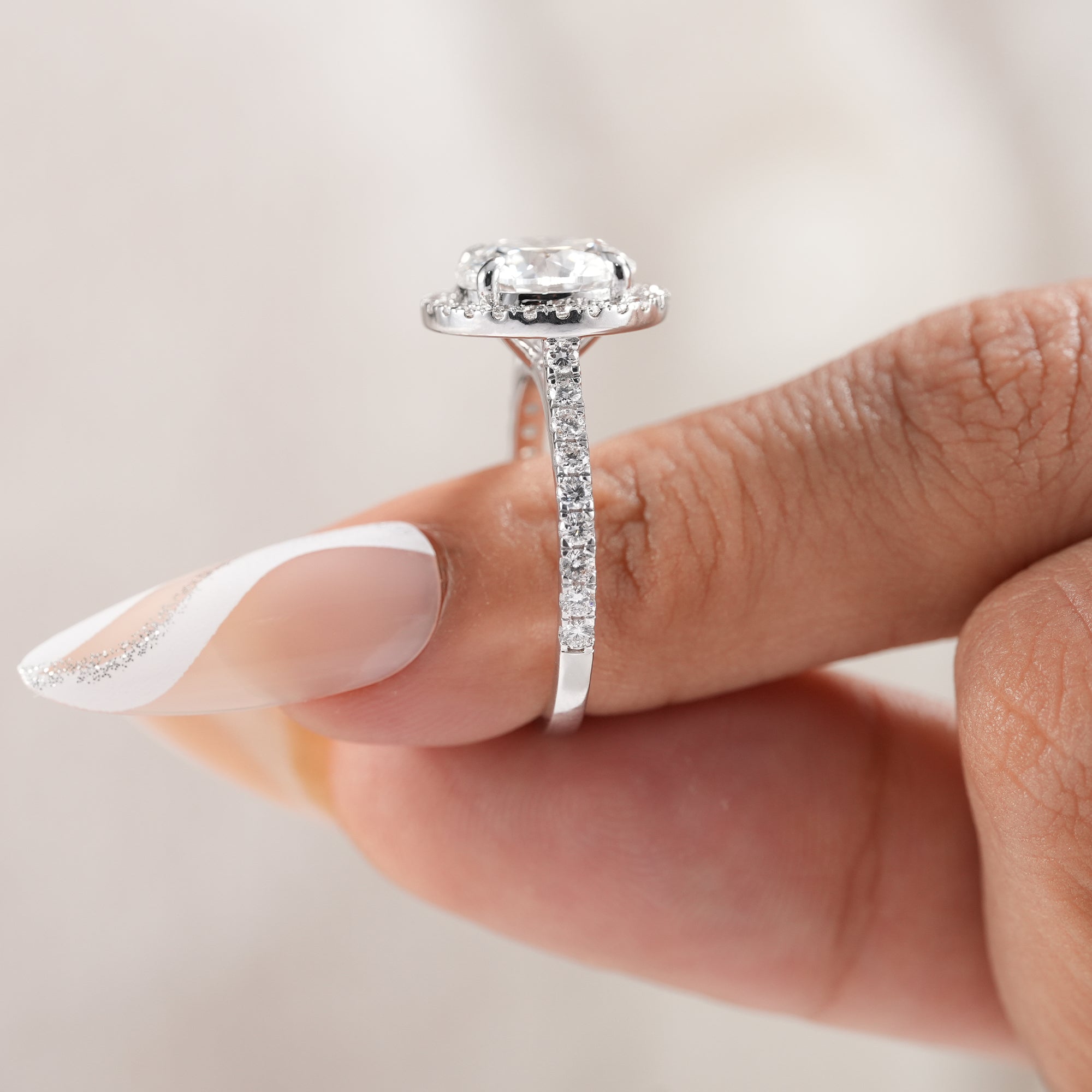 Round diamond bridal jewelry with pavé band.