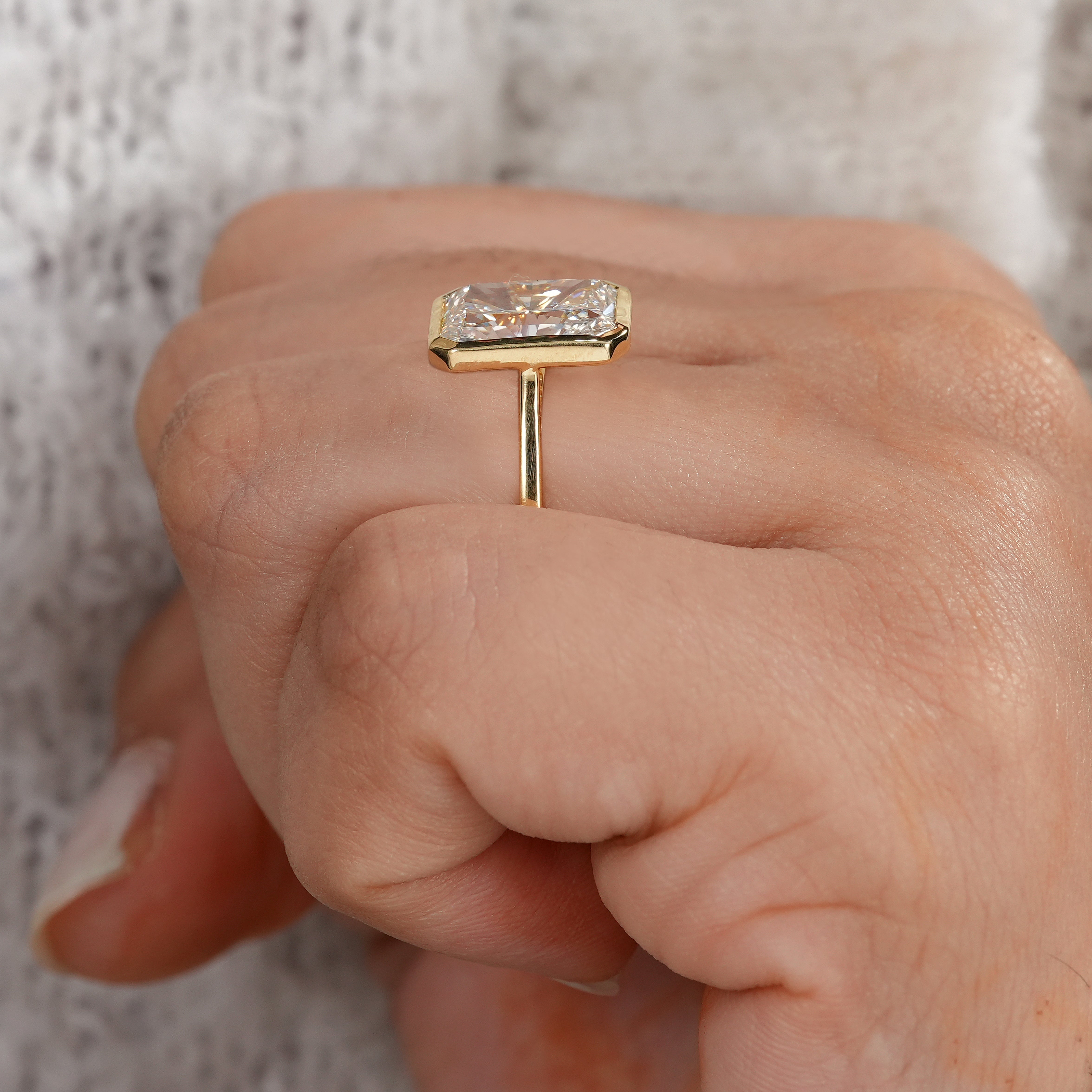 Contemporary radiant lab diamond engagement ring