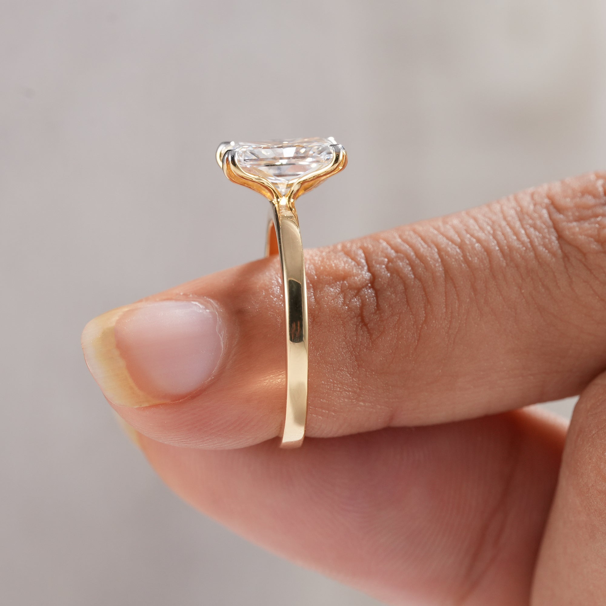 Fine jewelry radiant lab diamond ring with timeless design.