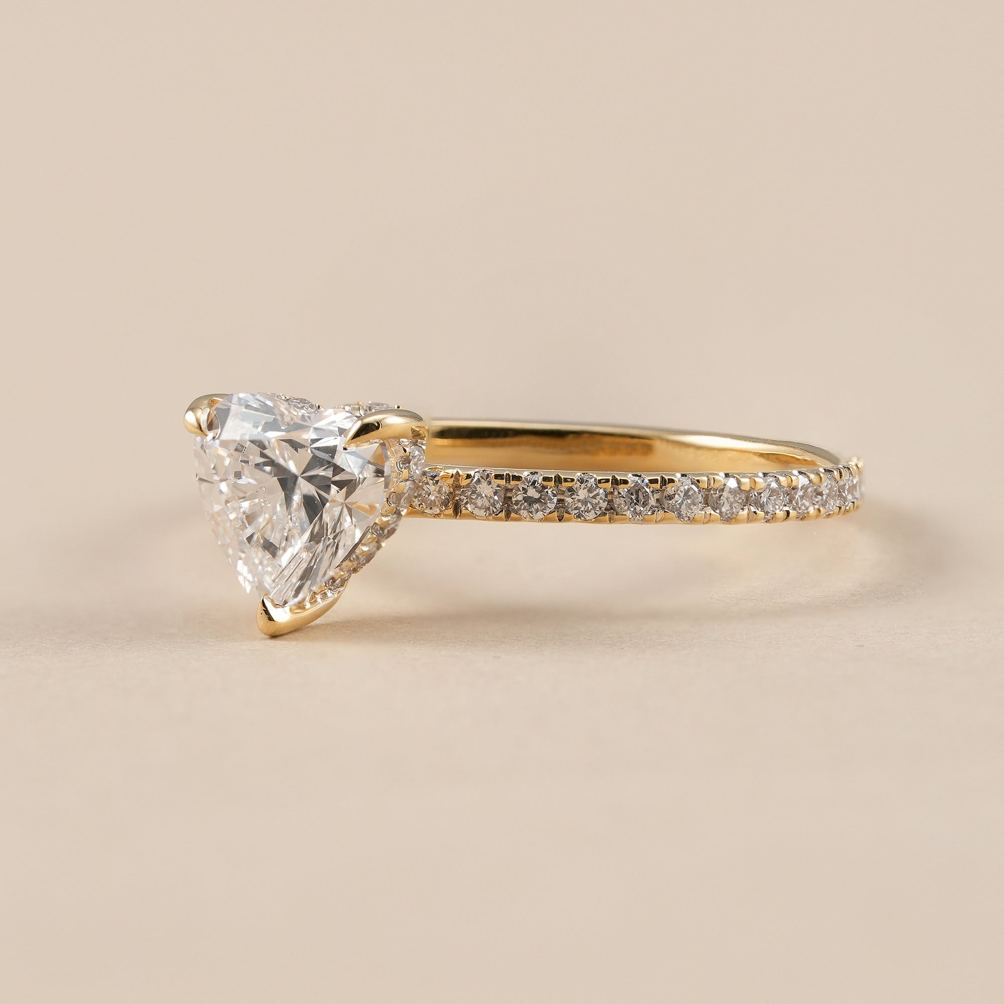 Heart cut solitaire diamond ring in yellow gold