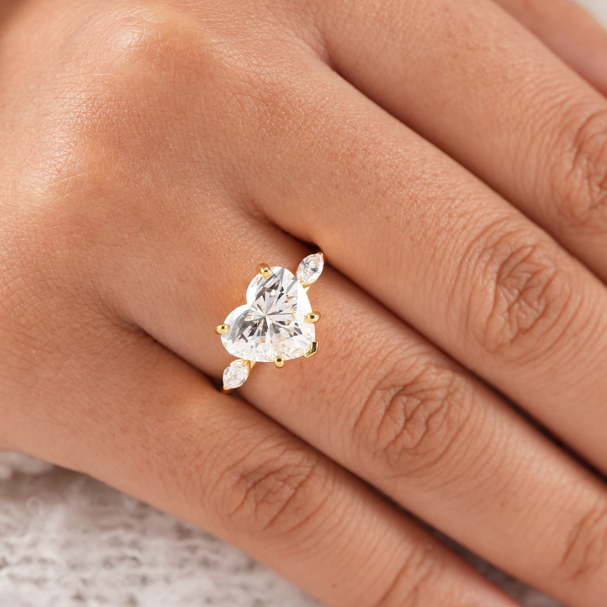 Elegant heart shaped diamond ring crafted in solid gold.