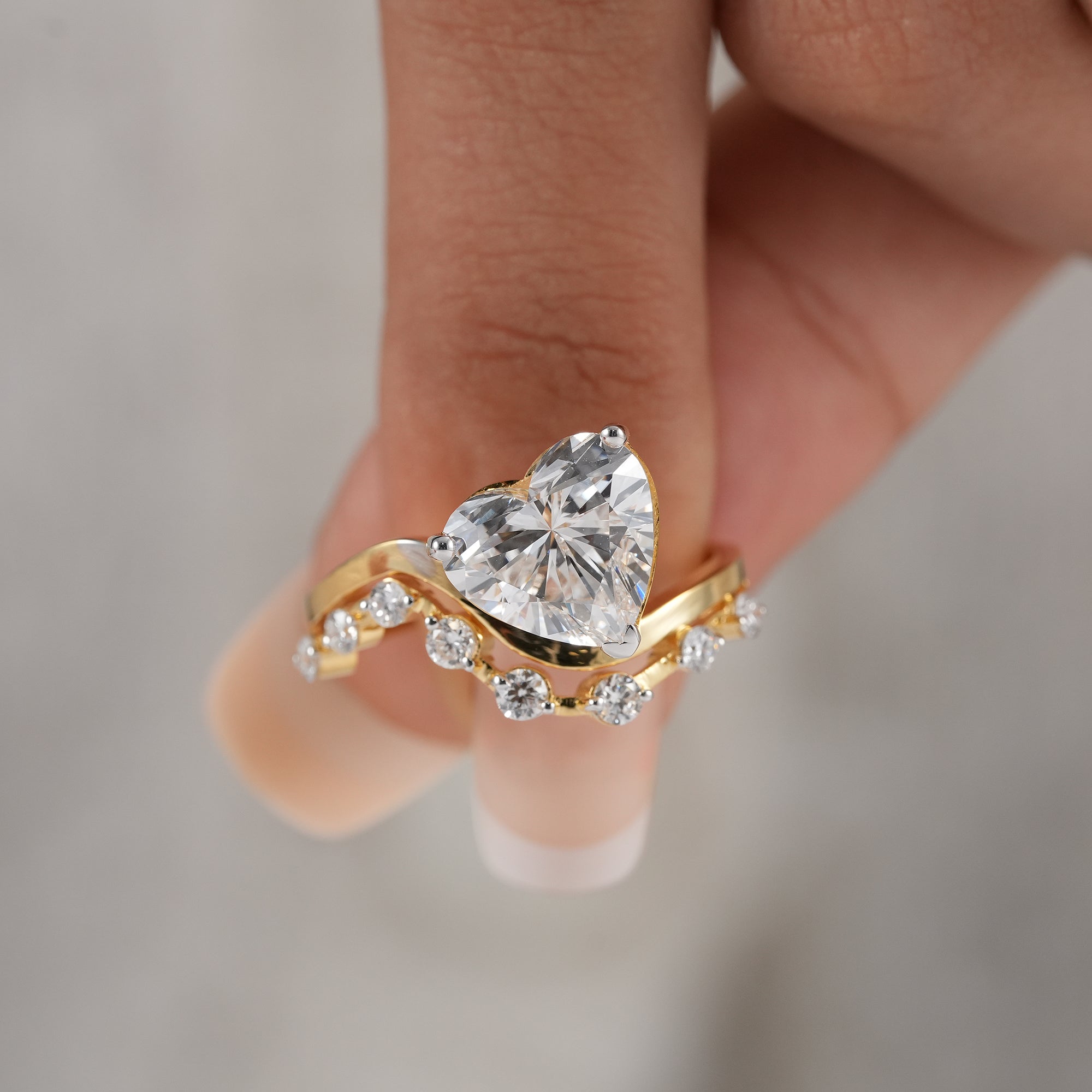 Heart cut lab grown diamond ring for women in yellow gold.