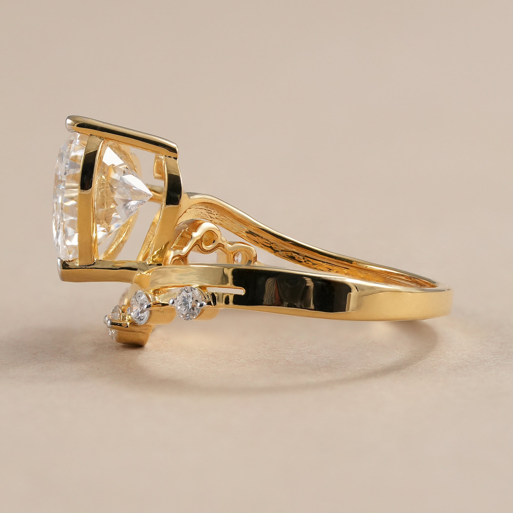 Heart diamond engagement ring with round diamond curved shank.