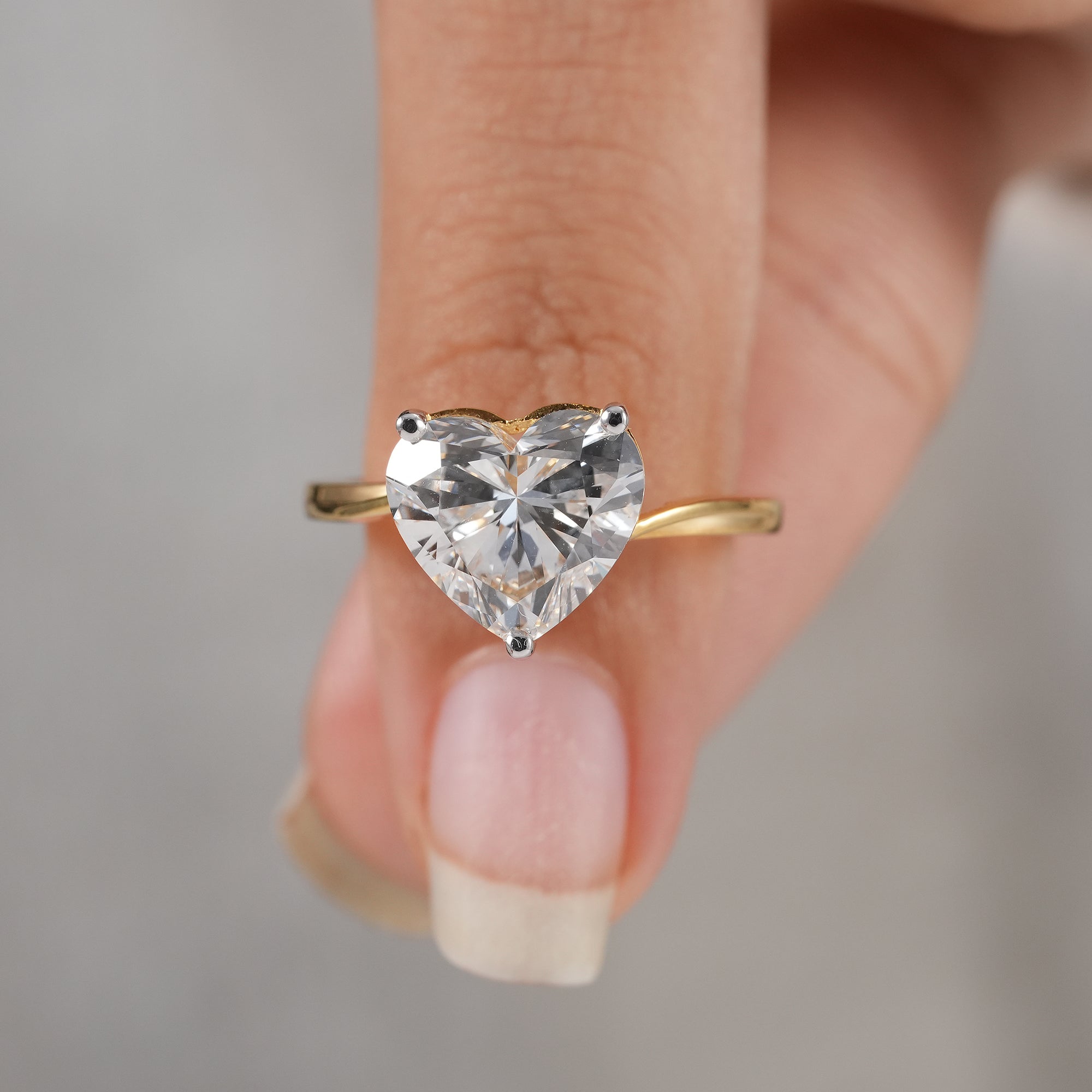 Sustainable lab grown heart diamond ring for proposal.