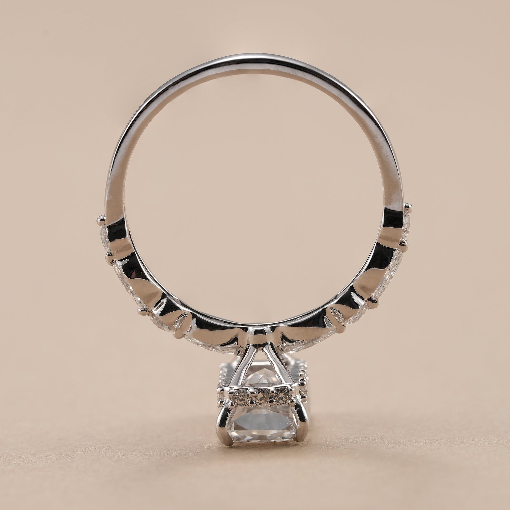 White gold hidden halo radiant diamond bridal ring.