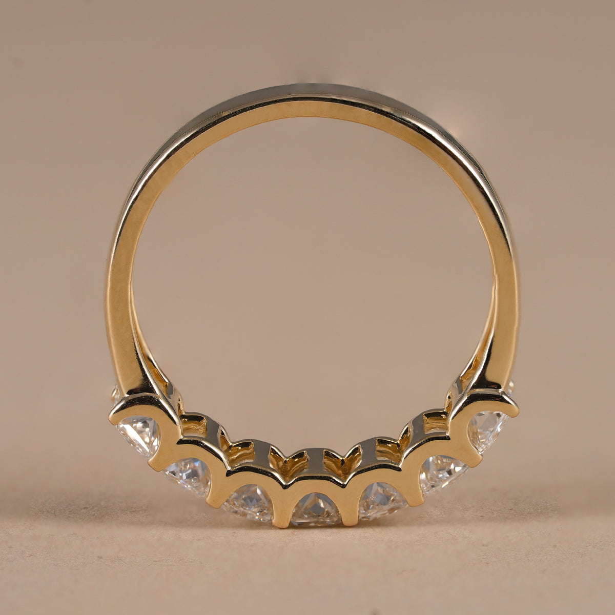 IGI certified radiant diamond eternity ring with continuous lab grown diamonds in solid gold.