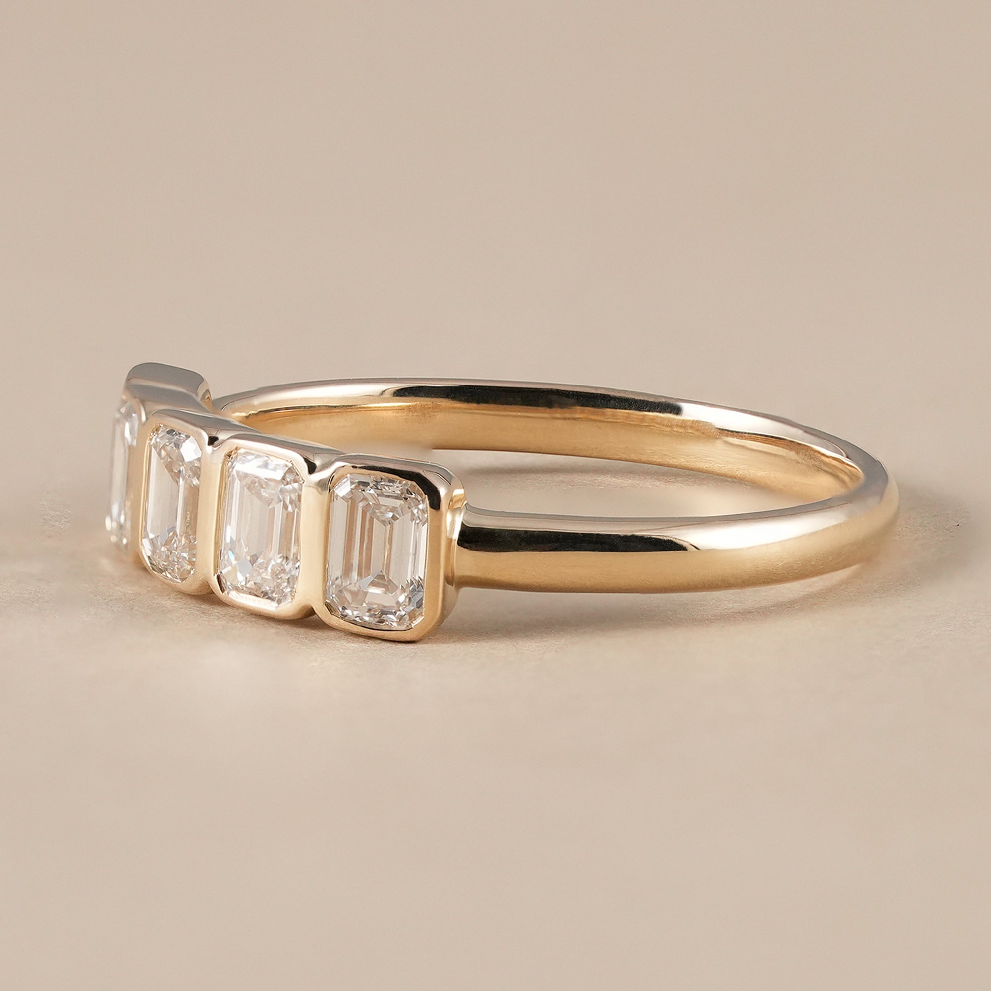 IGI certified emerald cut diamond half eternity band