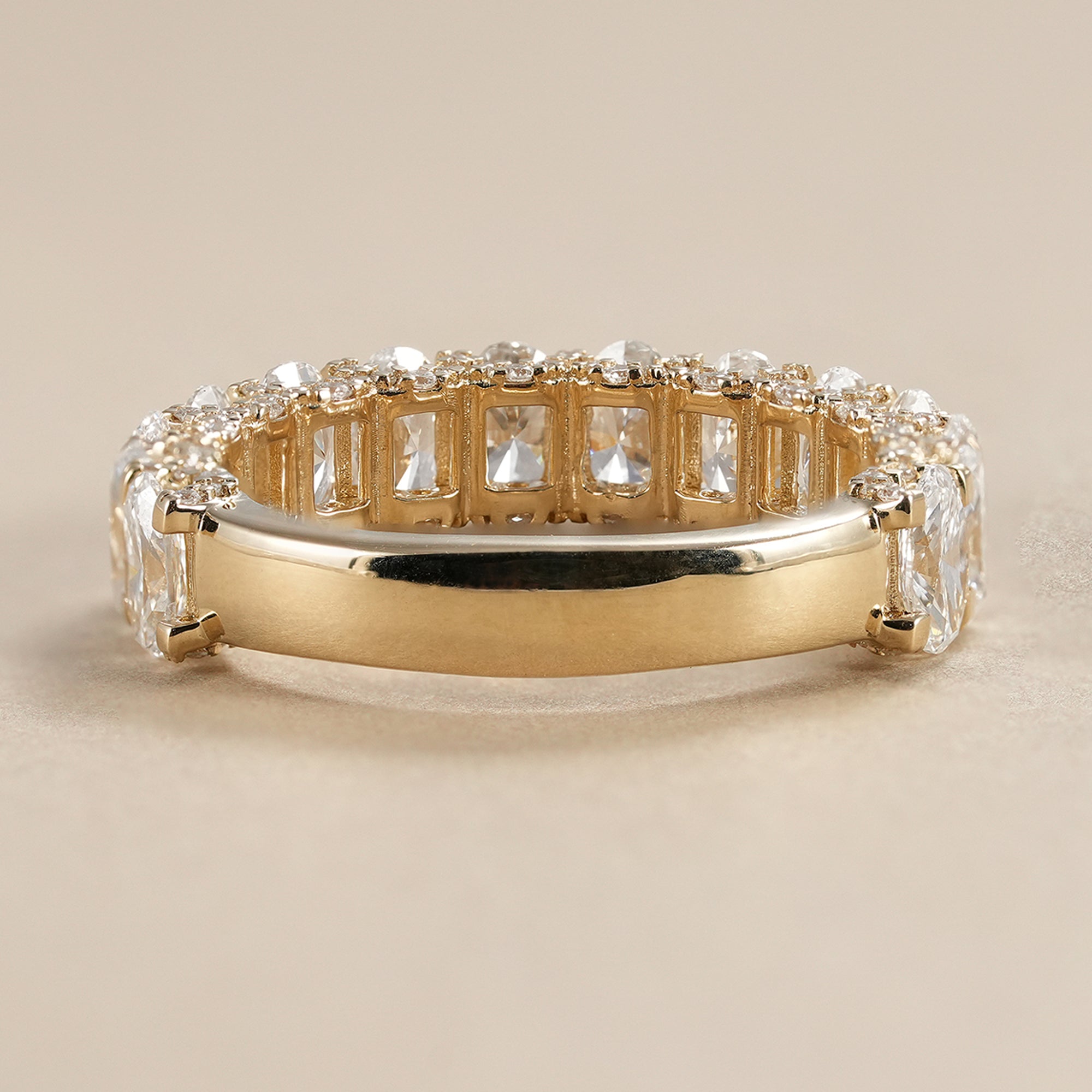 IGI certified oval lab diamond band designed as a timeless bridal wedding ring.