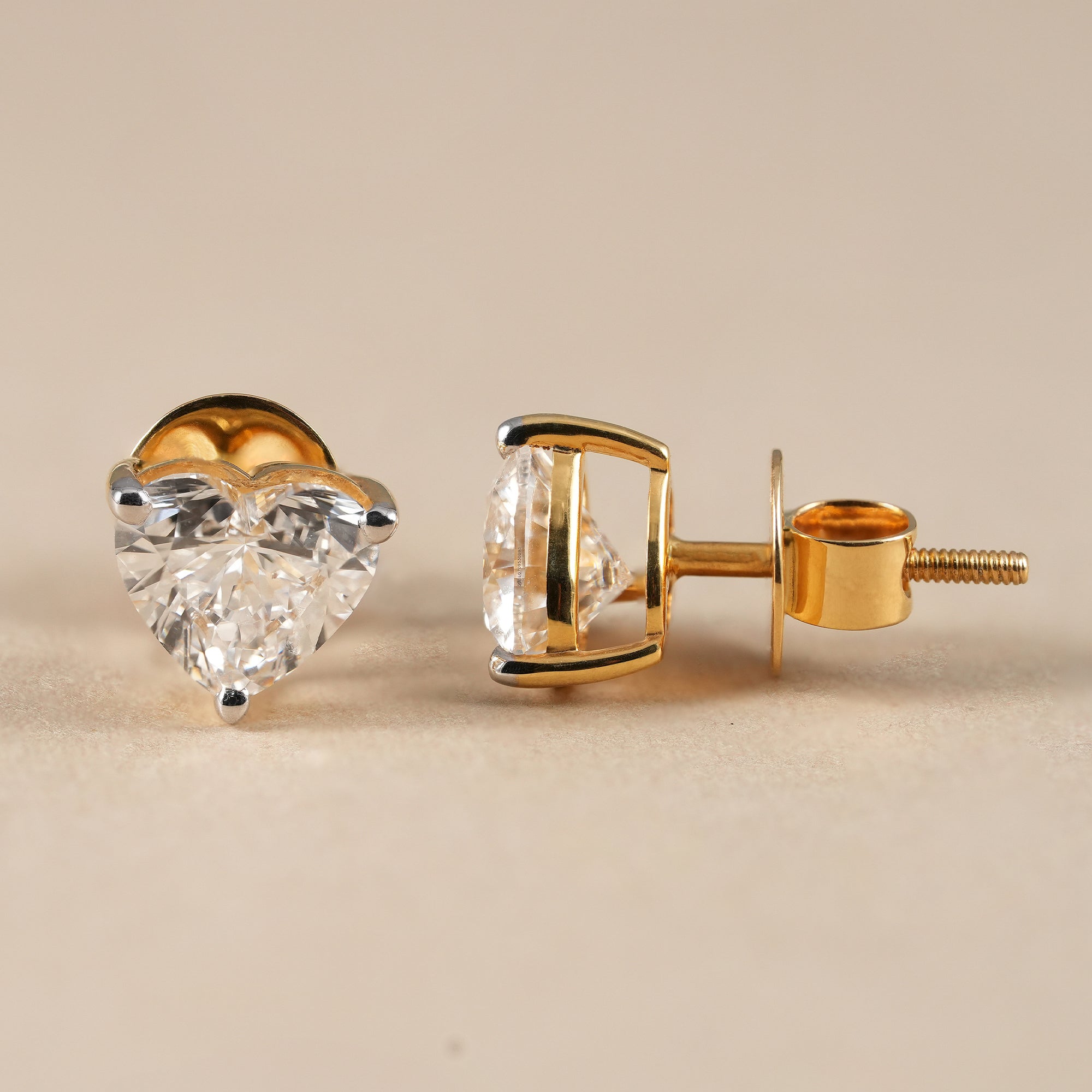 IGI certified heart solitaire diamond stud earrings