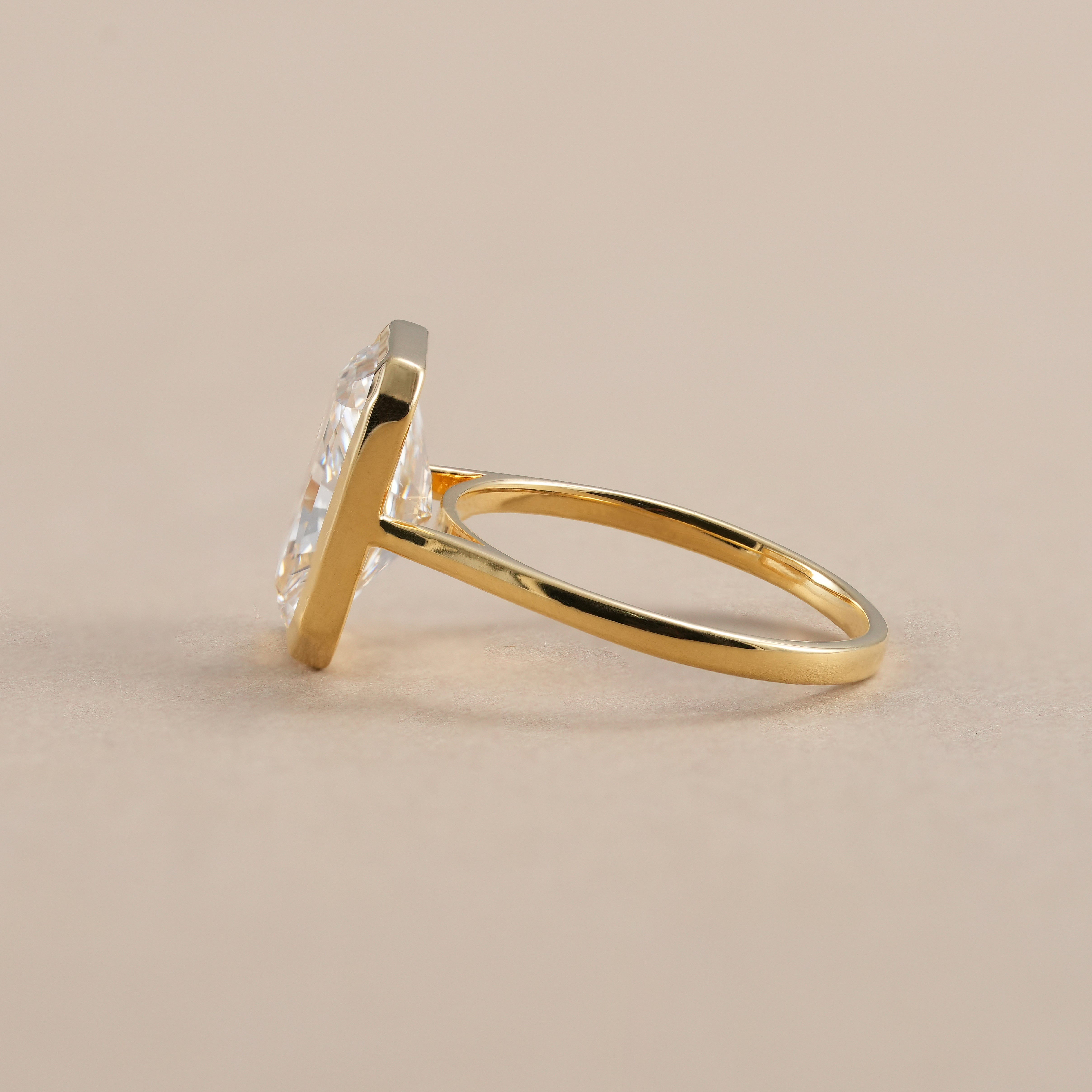 Bezel set radiant diamond engagement ring front view