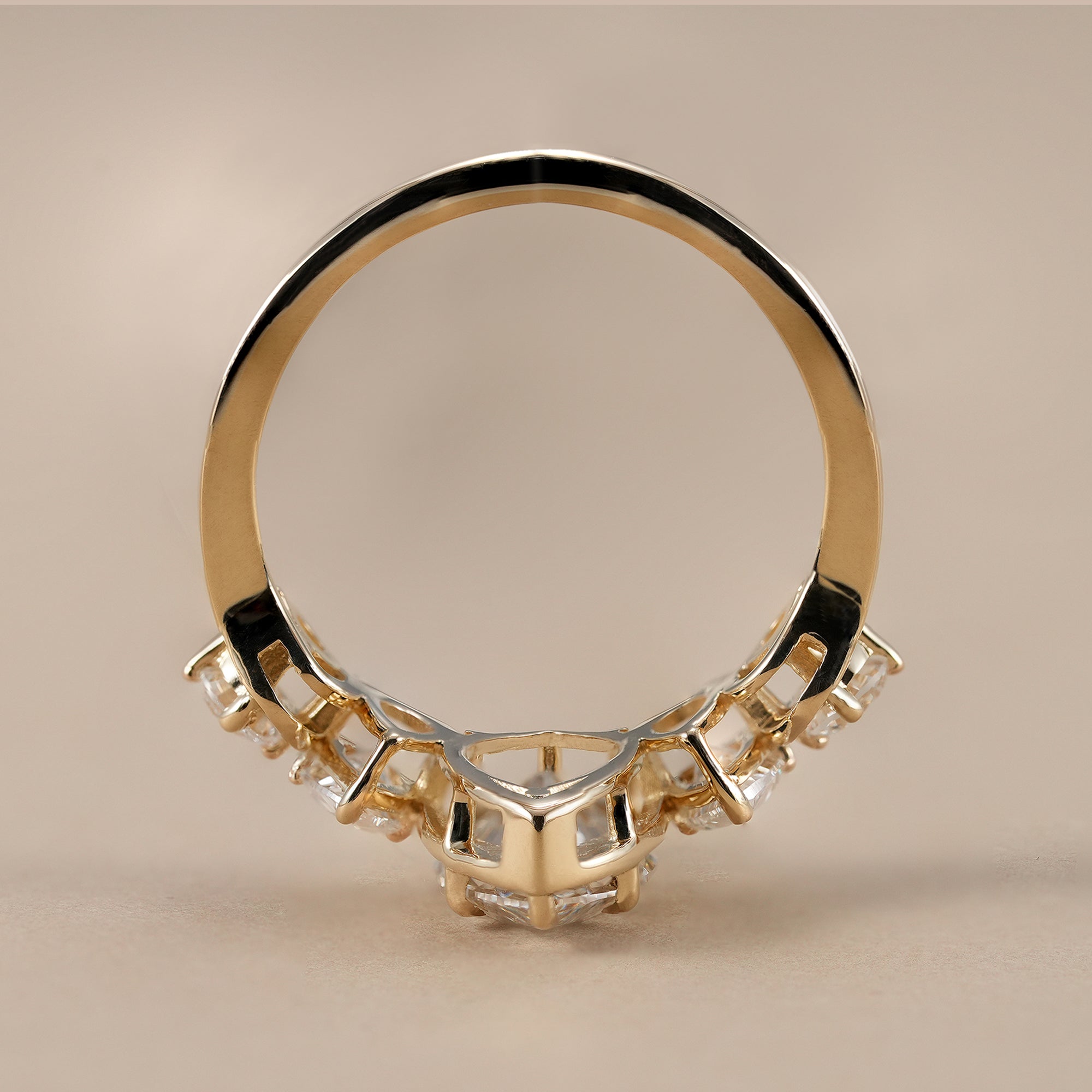 Marquise engagement ring with pear side diamonds