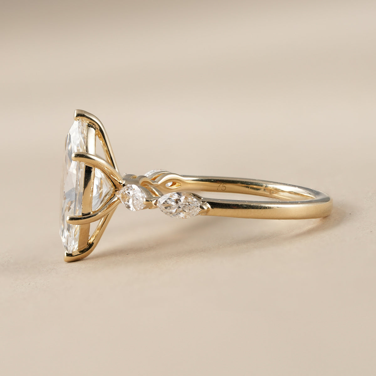 Luxury marquise diamond engagement ring handcrafted with brilliant lab grown diamonds.
