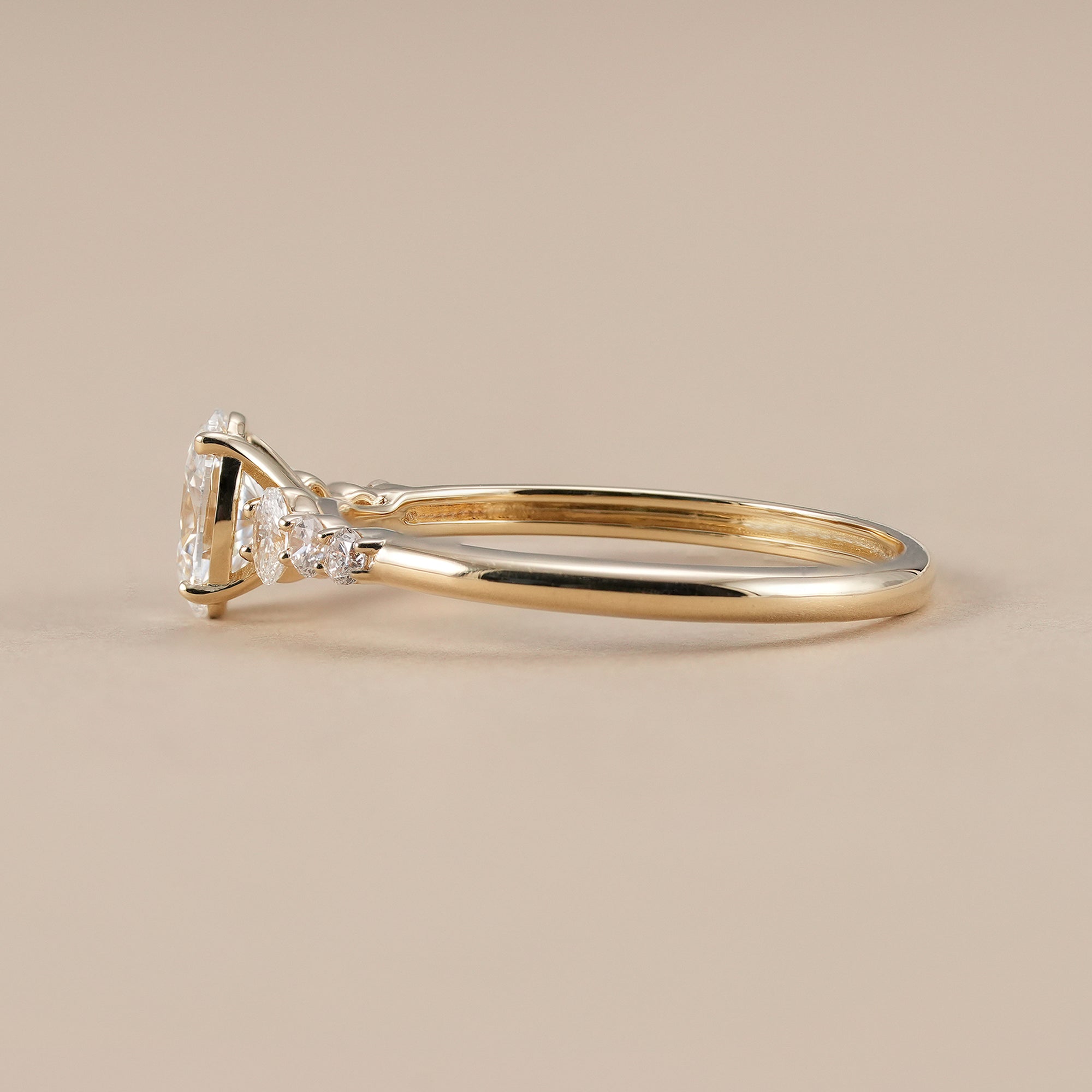 Women's oval lab diamond bridal ring in yellow gold