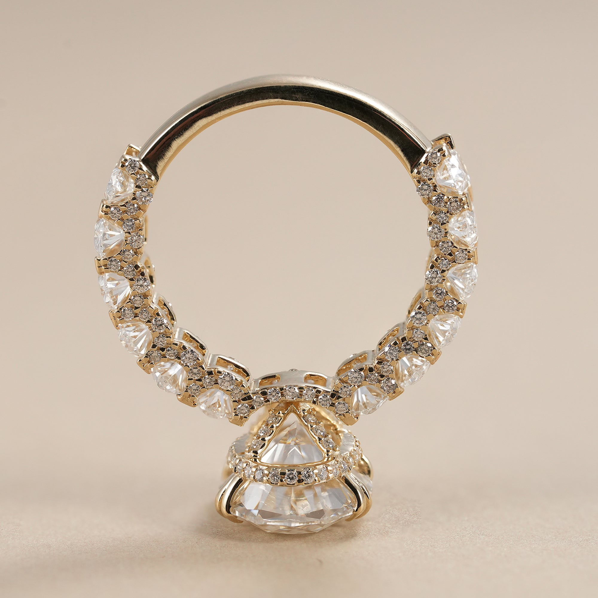 Handmade oval lab grown diamond ring crafted in solid gold with luxurious diamond accents.