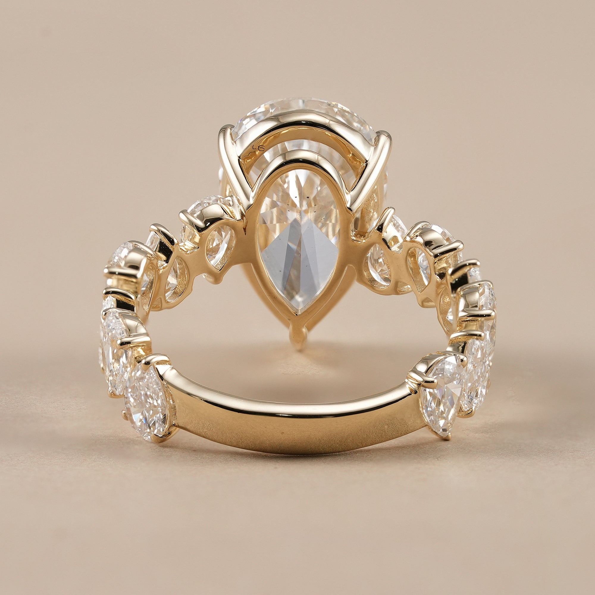 Pear solitaire diamond ring handcrafted in solid gold