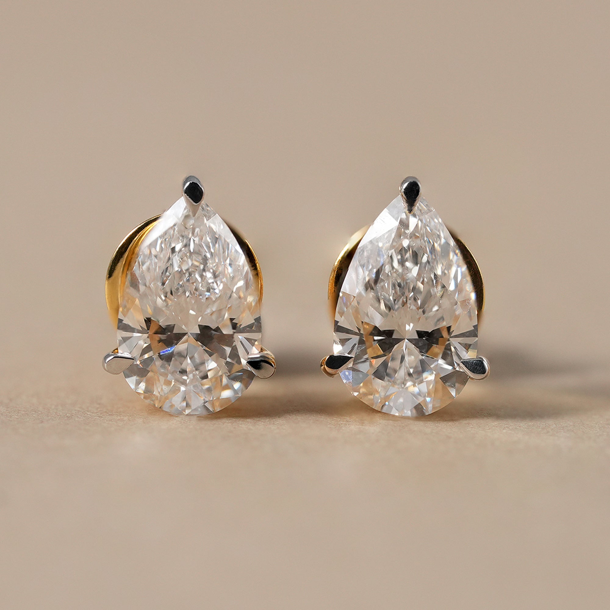 IGI certified pear lab grown diamond stud earrings in solid gold