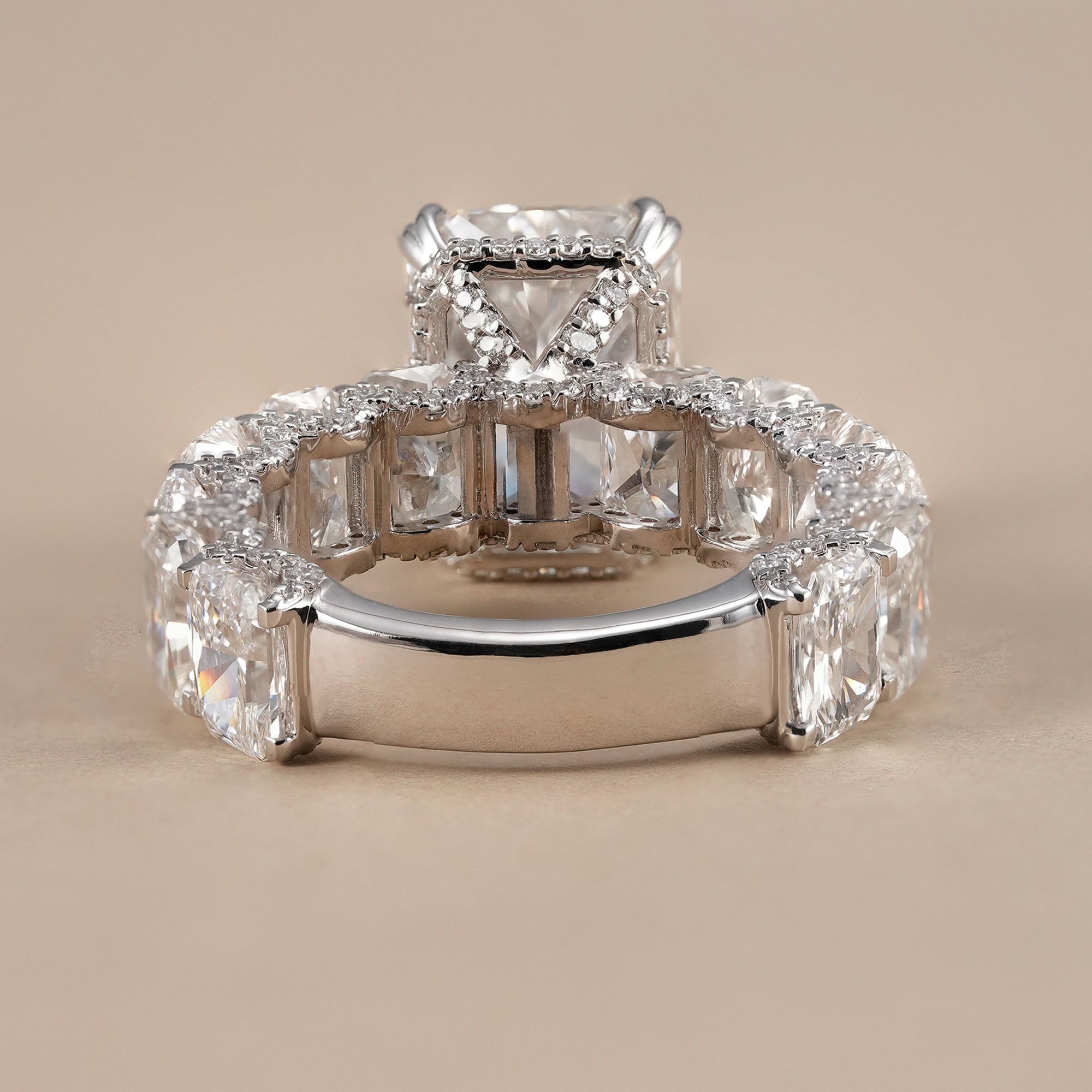 Radiant cluster engagement ring featuring lab grown diamond