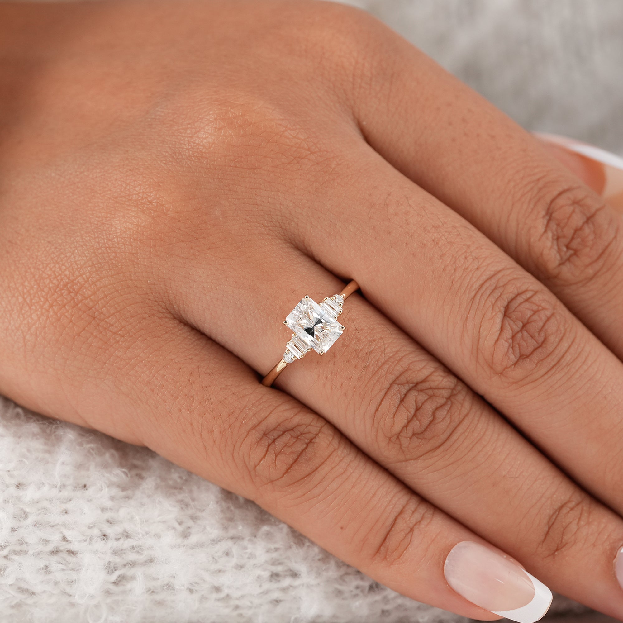 Seven stone radiant diamond engagement ring close-up