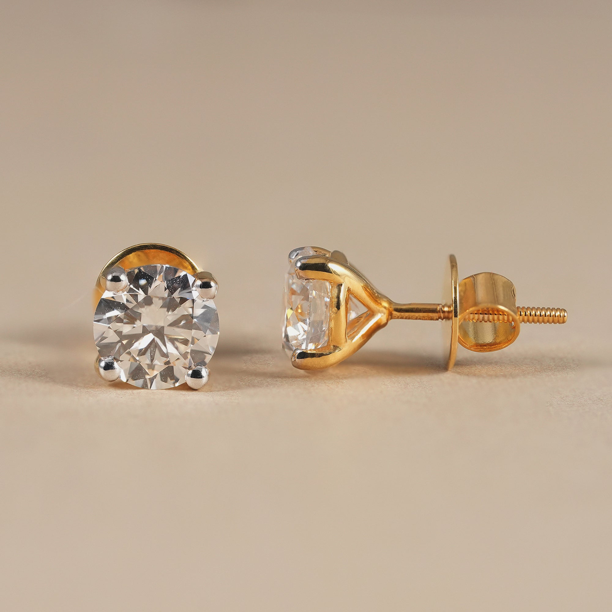 IGI certified round solitaire diamond stud earrings