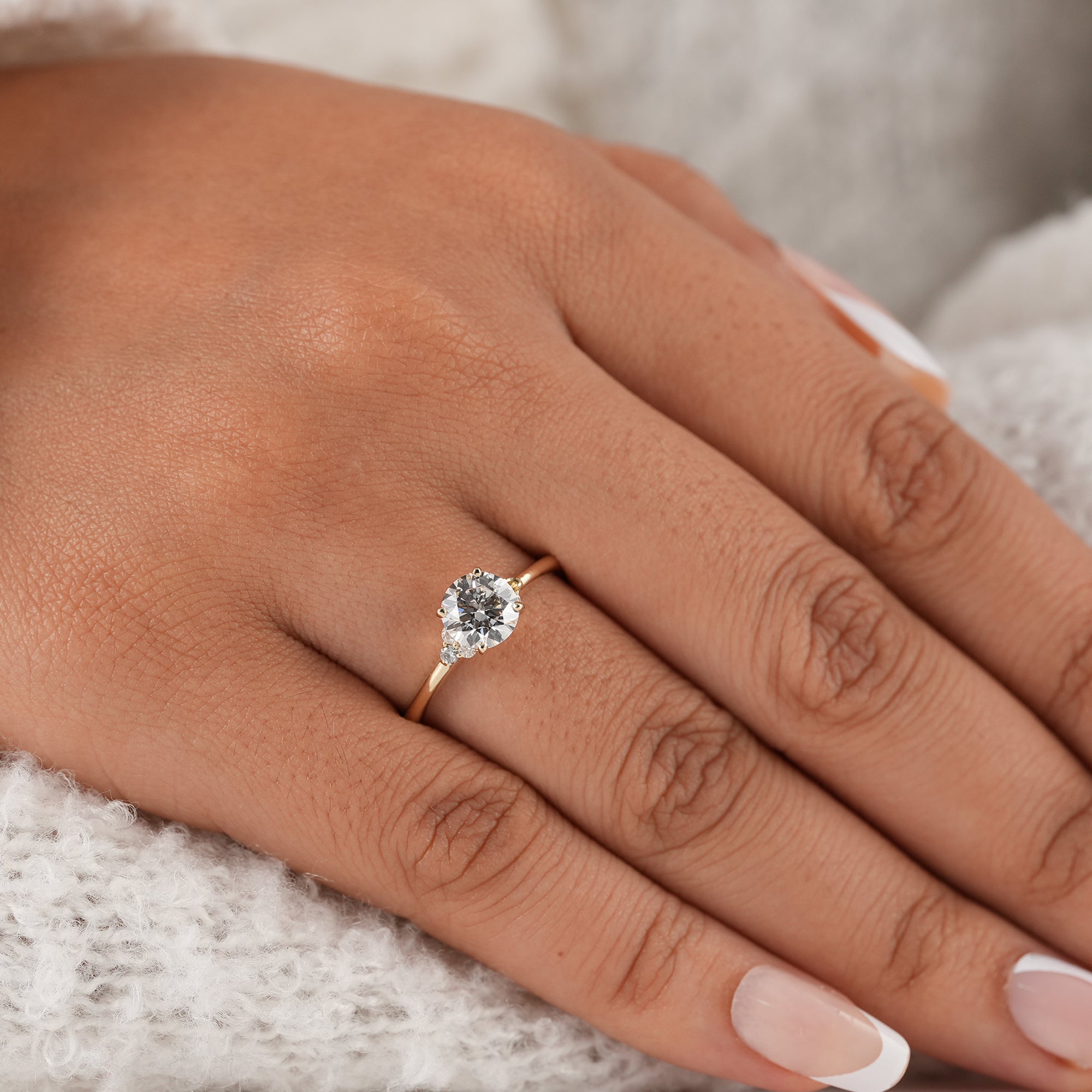 Minimalist round lab diamond engagement ring close-up
