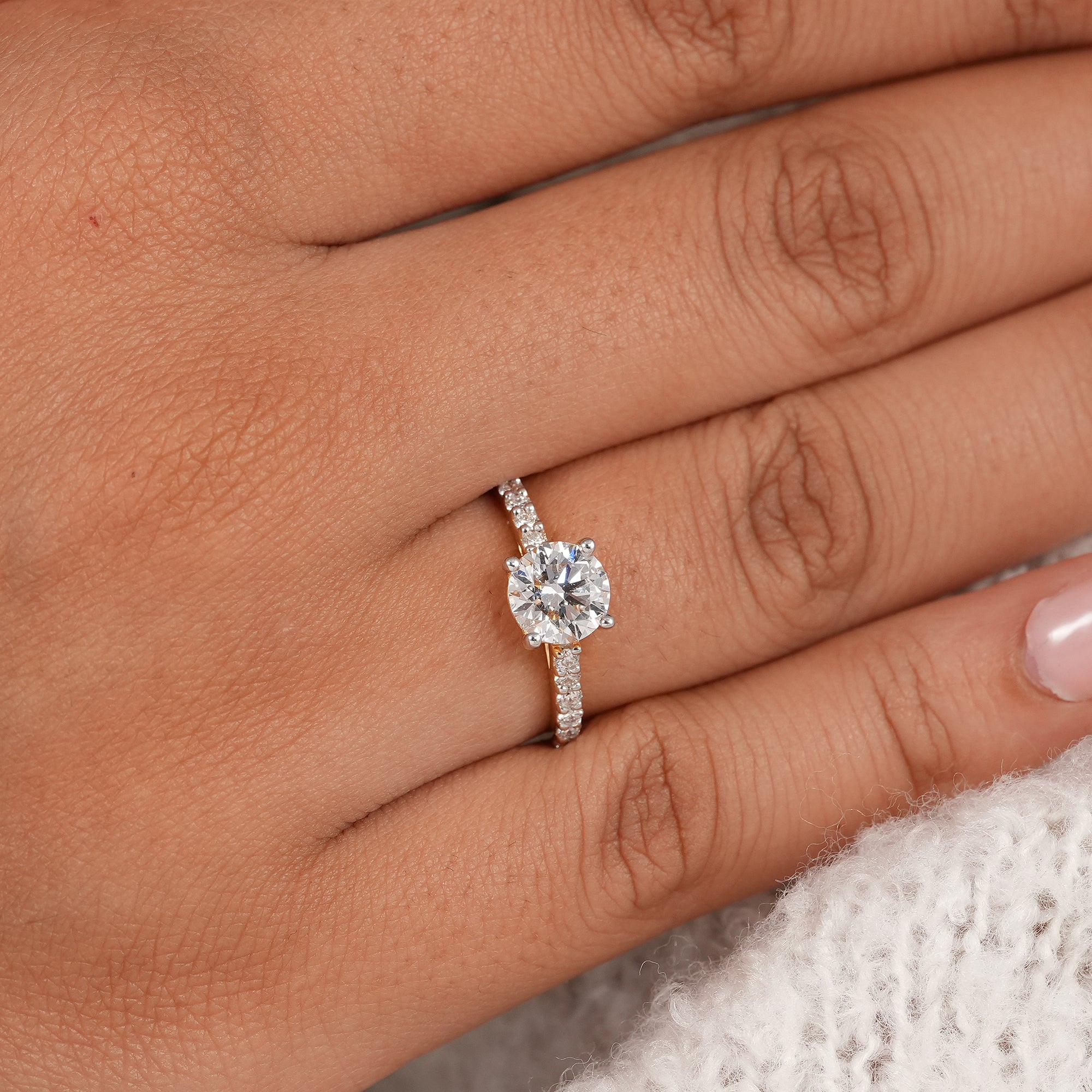 Minimalist round diamond engagement ring handcrafted in precious metal