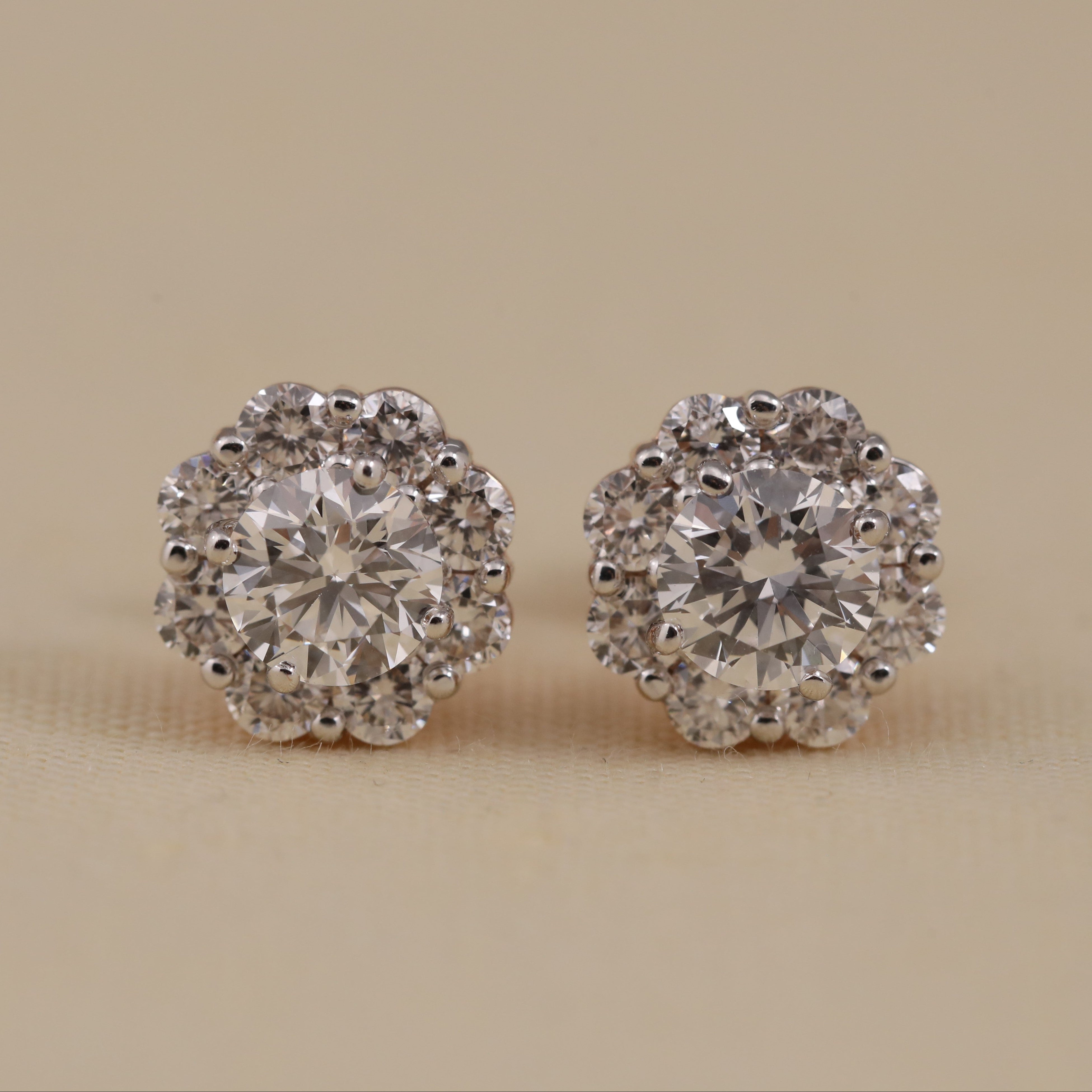 Round halo diamond stud earrings perfect for elegant anniversary gifting ideas