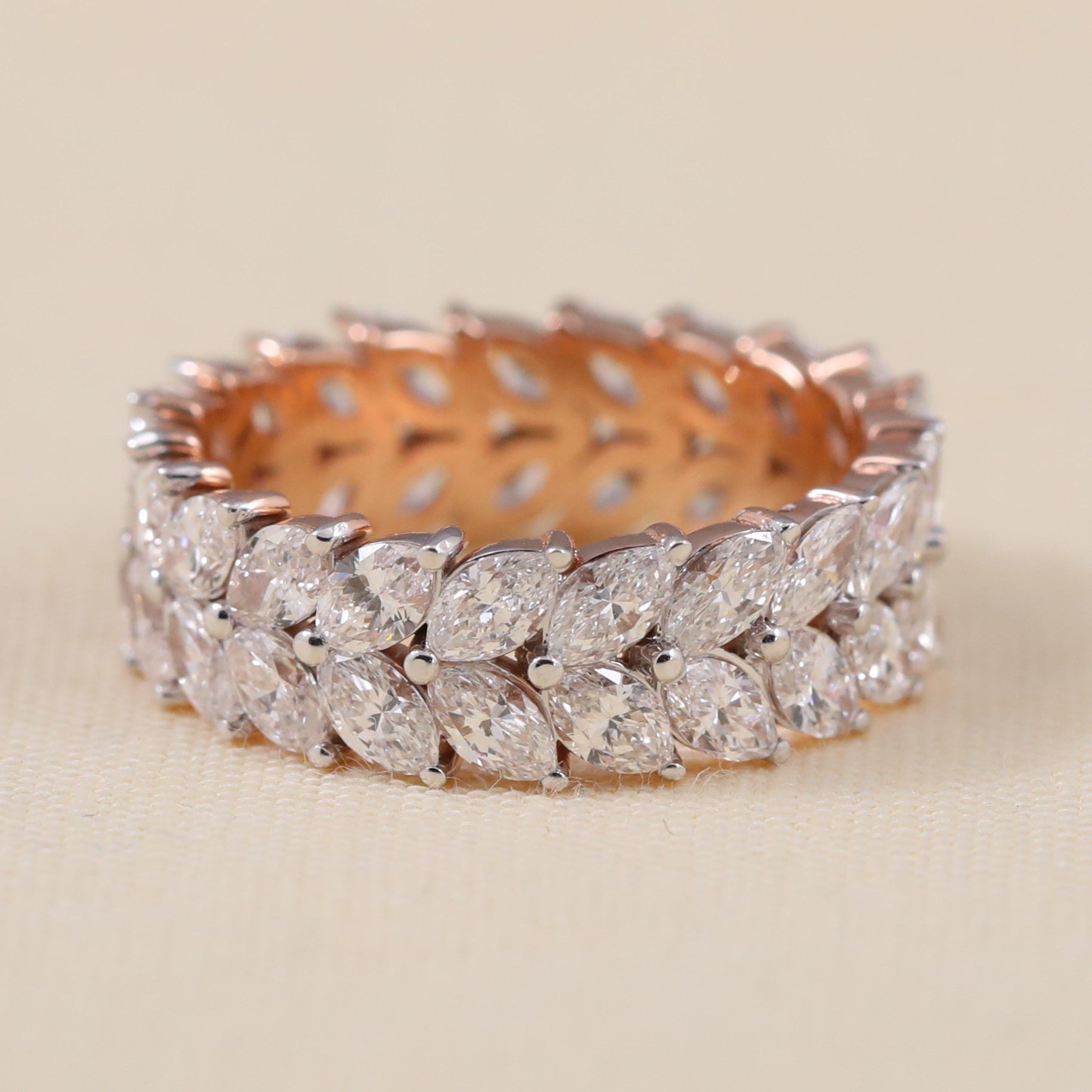 Marquise lab grown diamond eternity band featuring a full row of sparkle