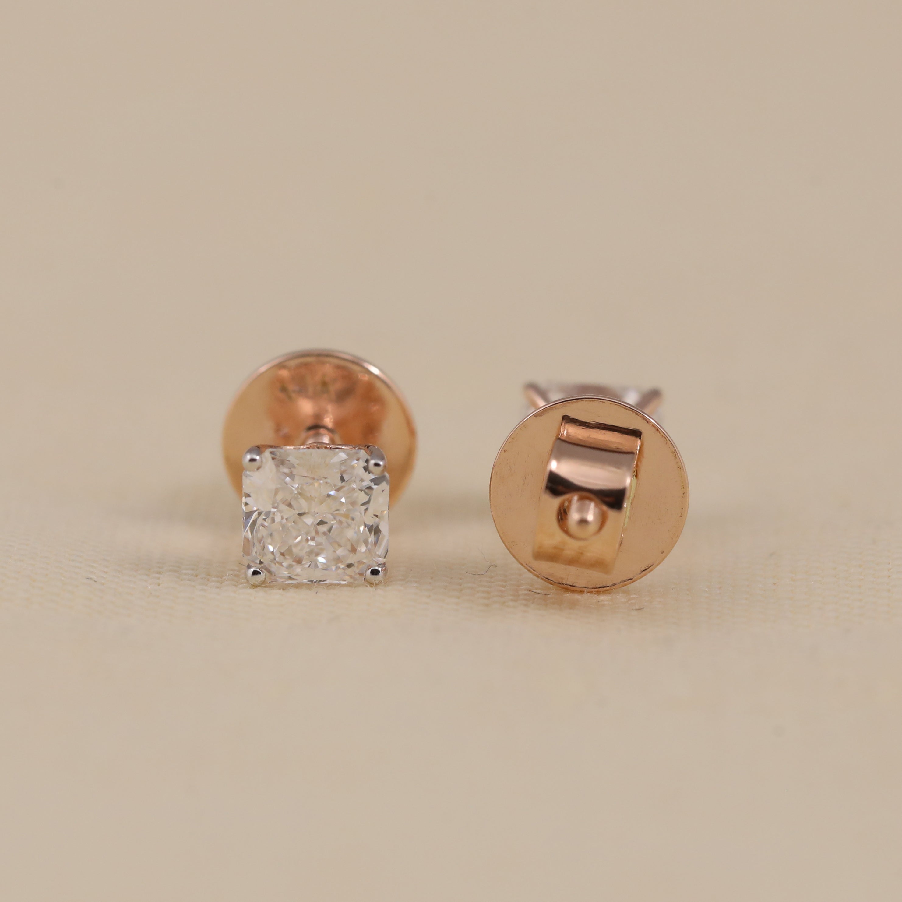 Elegant cushion diamond studs ideal for wedding events or festive wear.