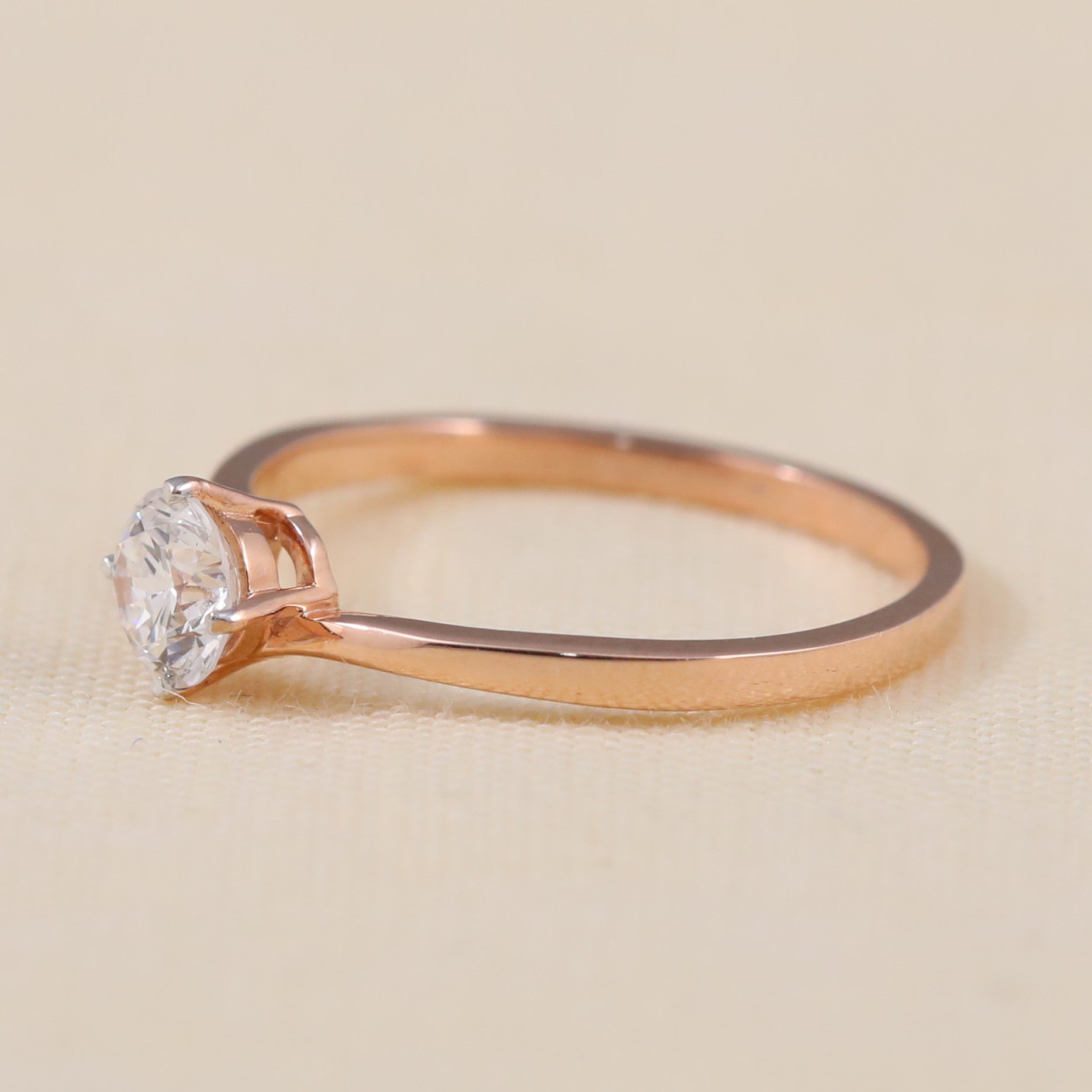 Timeless round lab grown diamond engagement ring crafted in a sleek style
