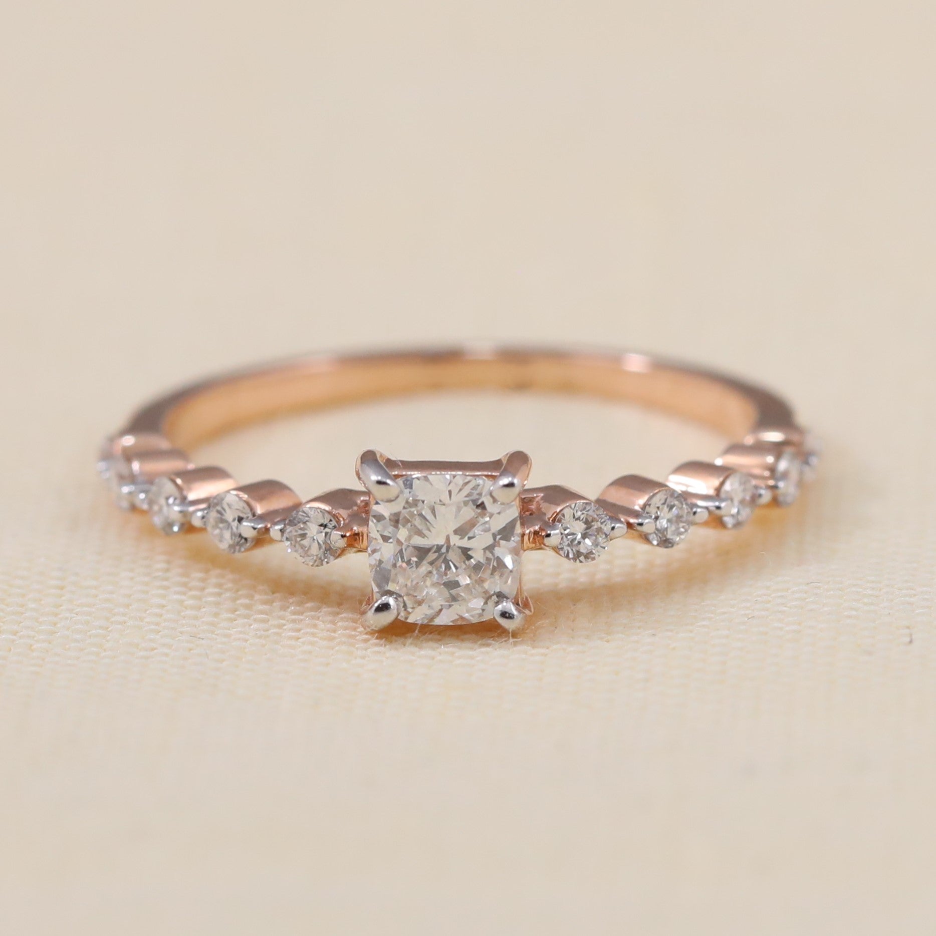 Cushion cut lab-grown diamond engagement ring with sparkling side stones for proposals