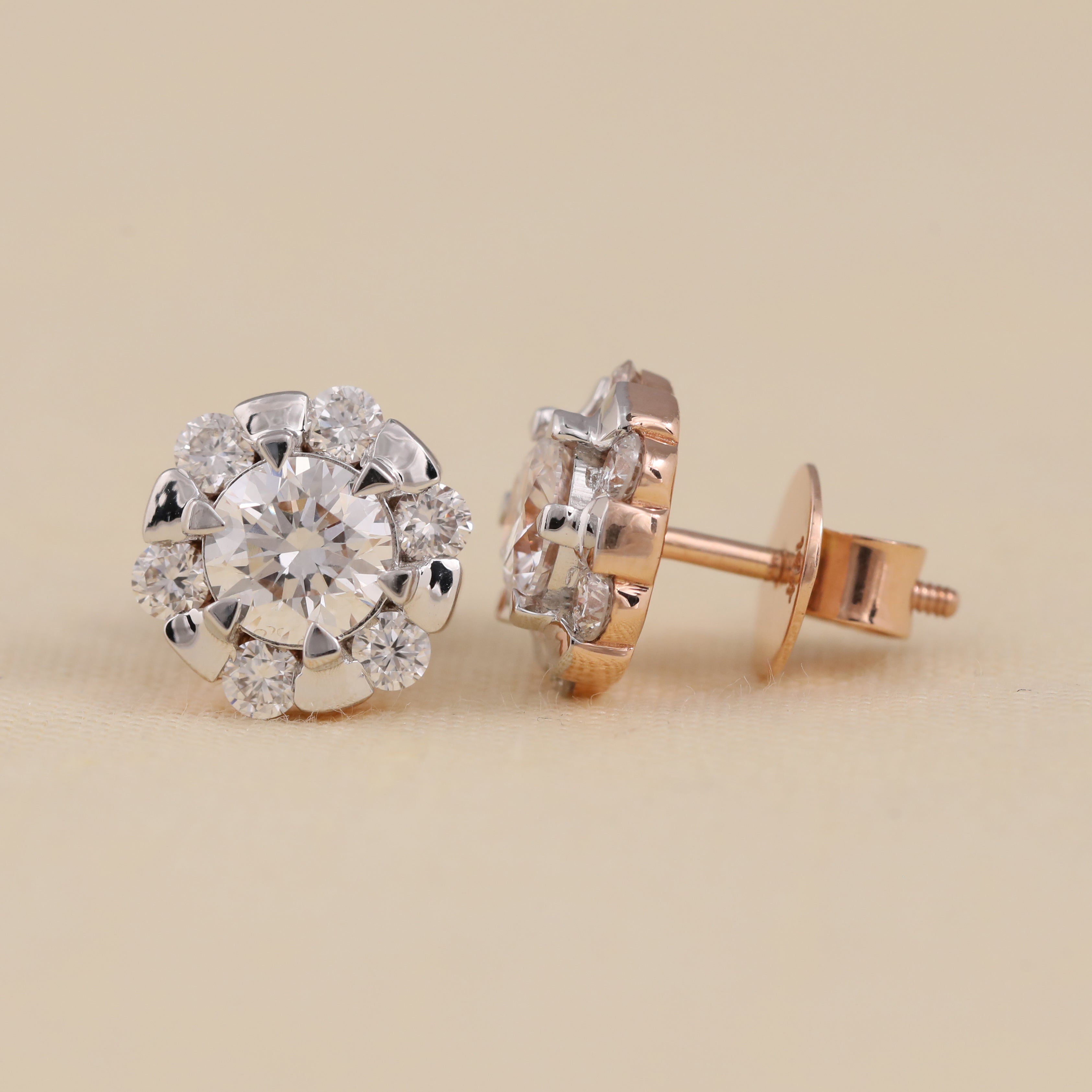 Brilliant round diamond cluster earrings suited for engagement and party looks.