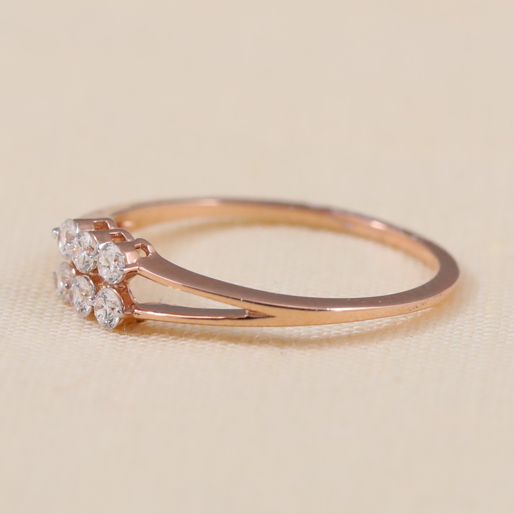 Delicate floral lab-grown diamond cluster ring on a slim split band
