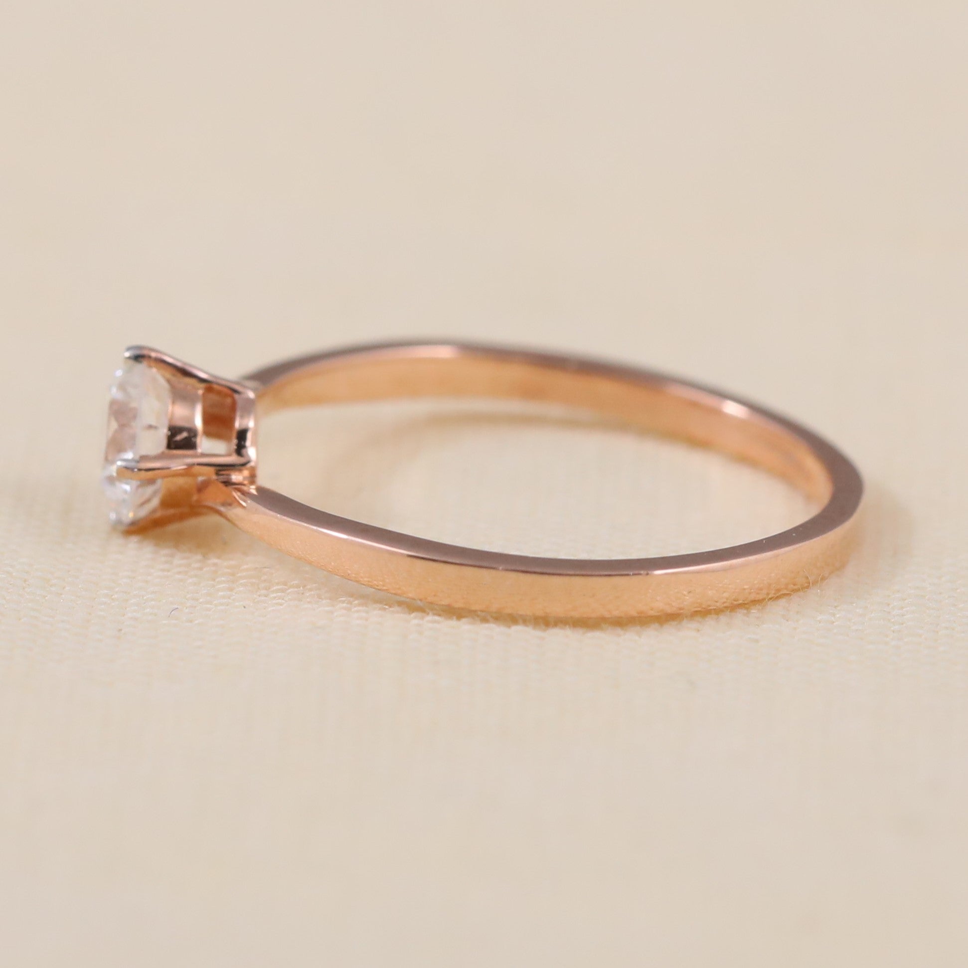 Timeless round lab grown diamond engagement ring crafted in a sleek style
