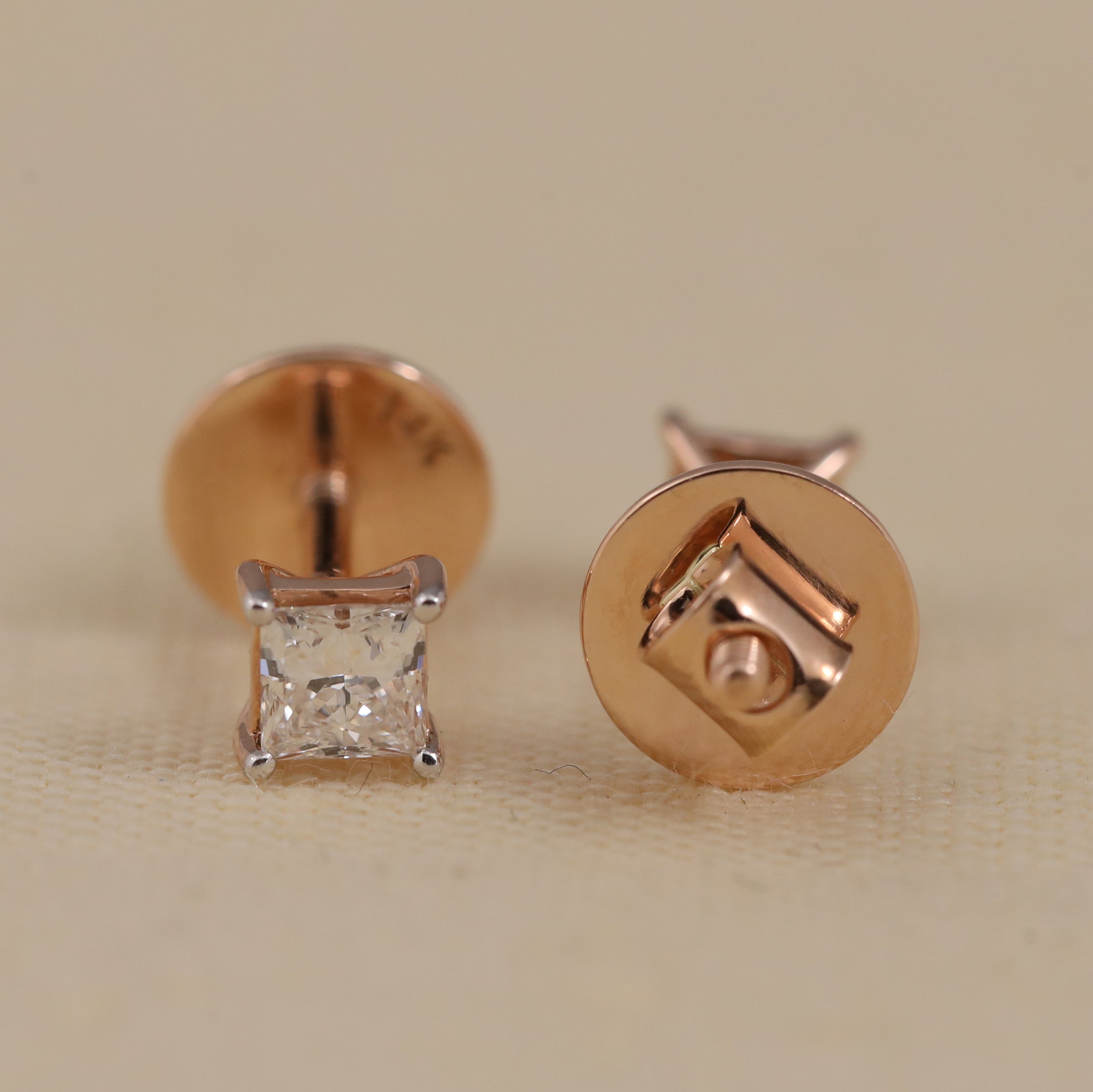 Elegant princess-cut diamond studs ideal for birthday and wedding occasions.