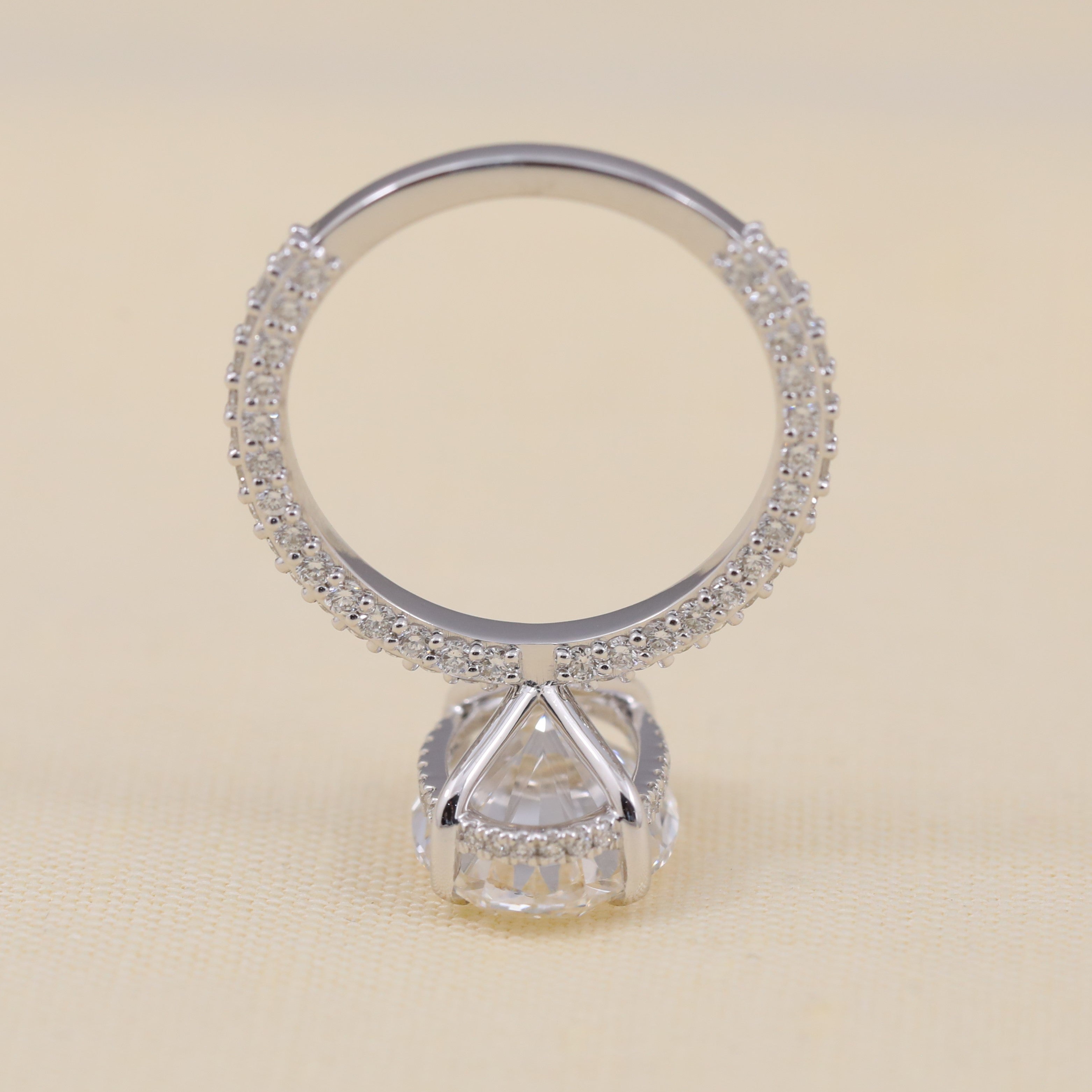 Modern pavé band ring featuring a radiant oval lab grown diamond center