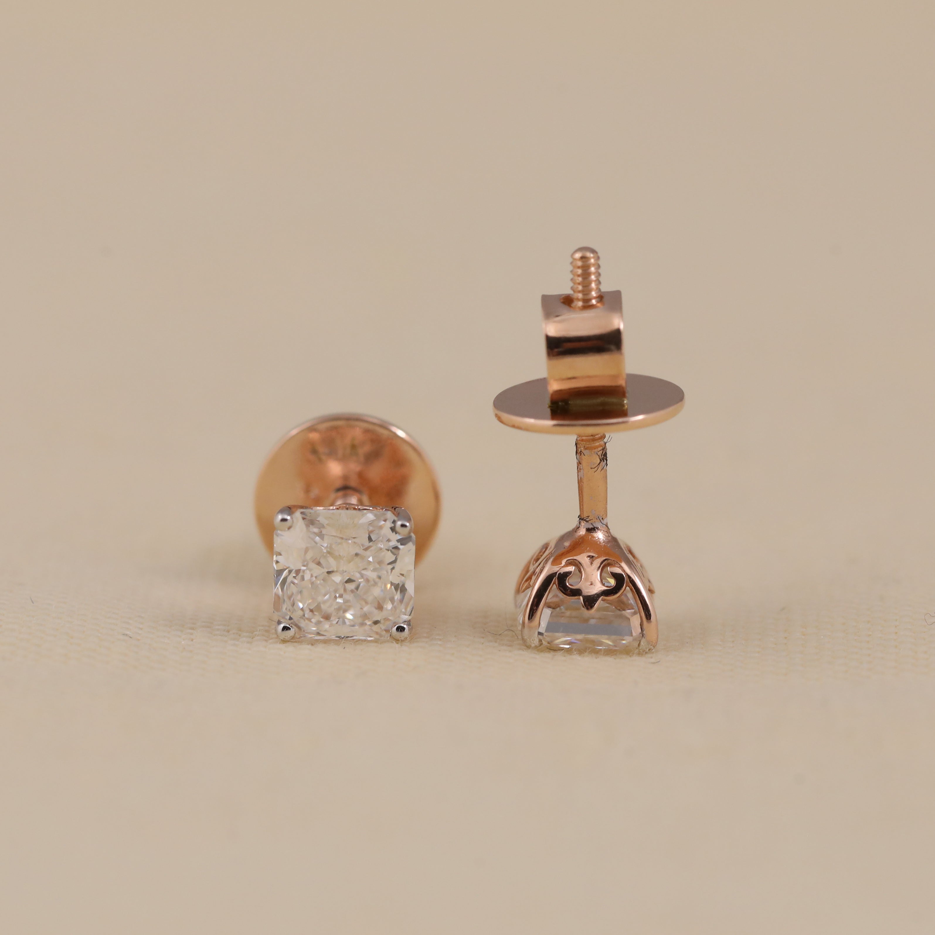 Sparkling cushion cut diamond earrings suited for daily wear and gifting.