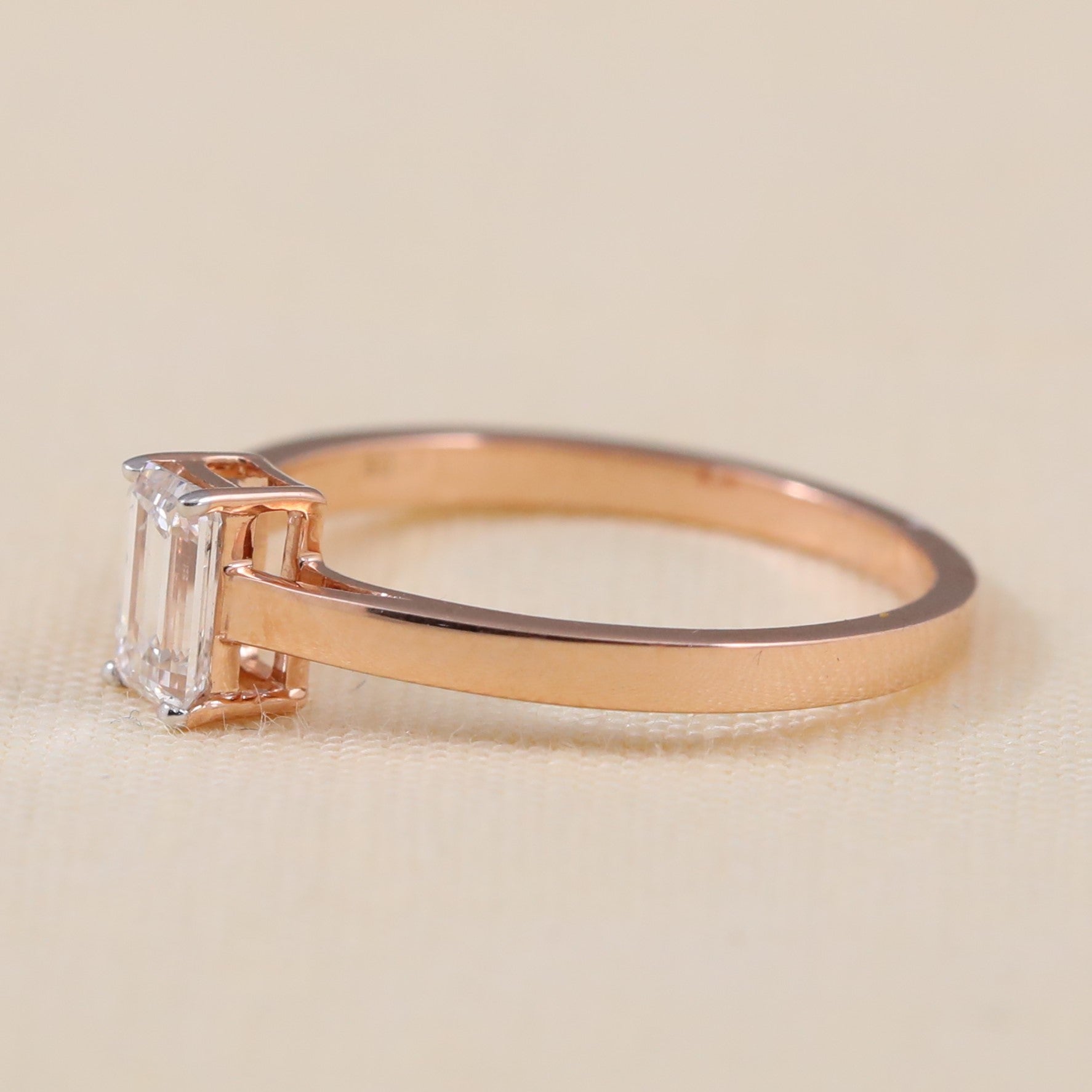 Elegant solitaire ring showcasing a radiant emerald cut lab grown diamond center