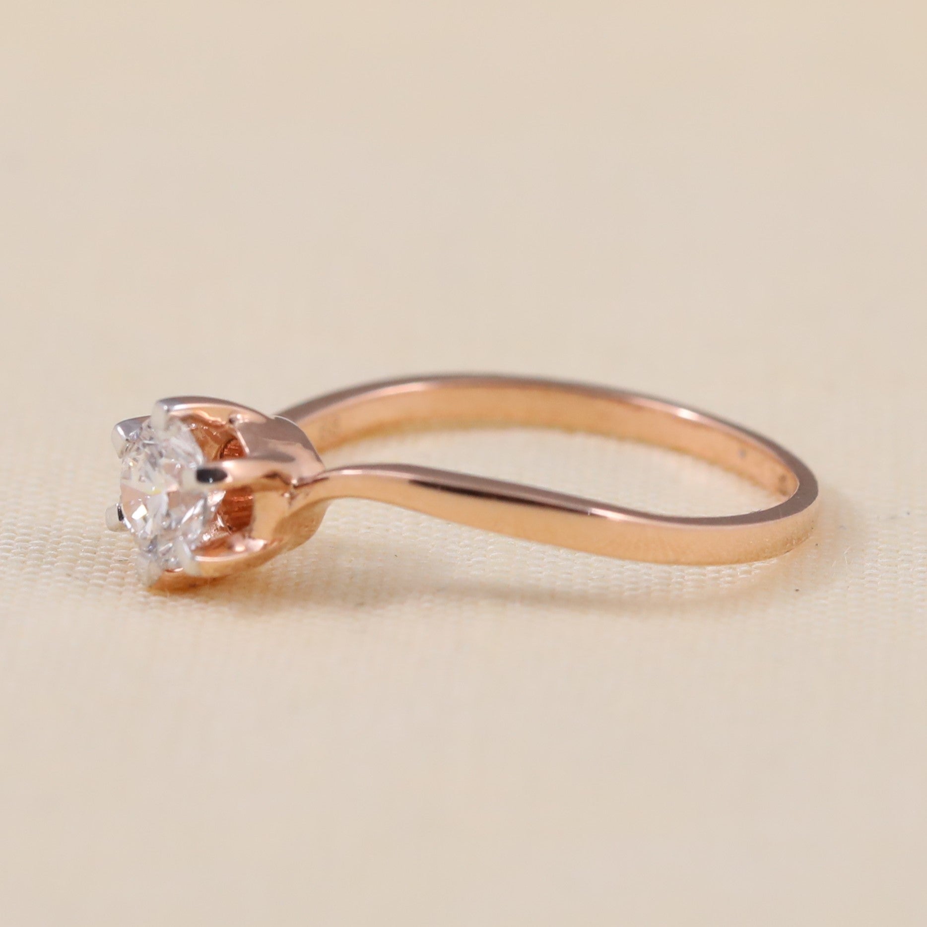 Minimalist solitaire ring showcasing a brilliant round lab grown diamond center
