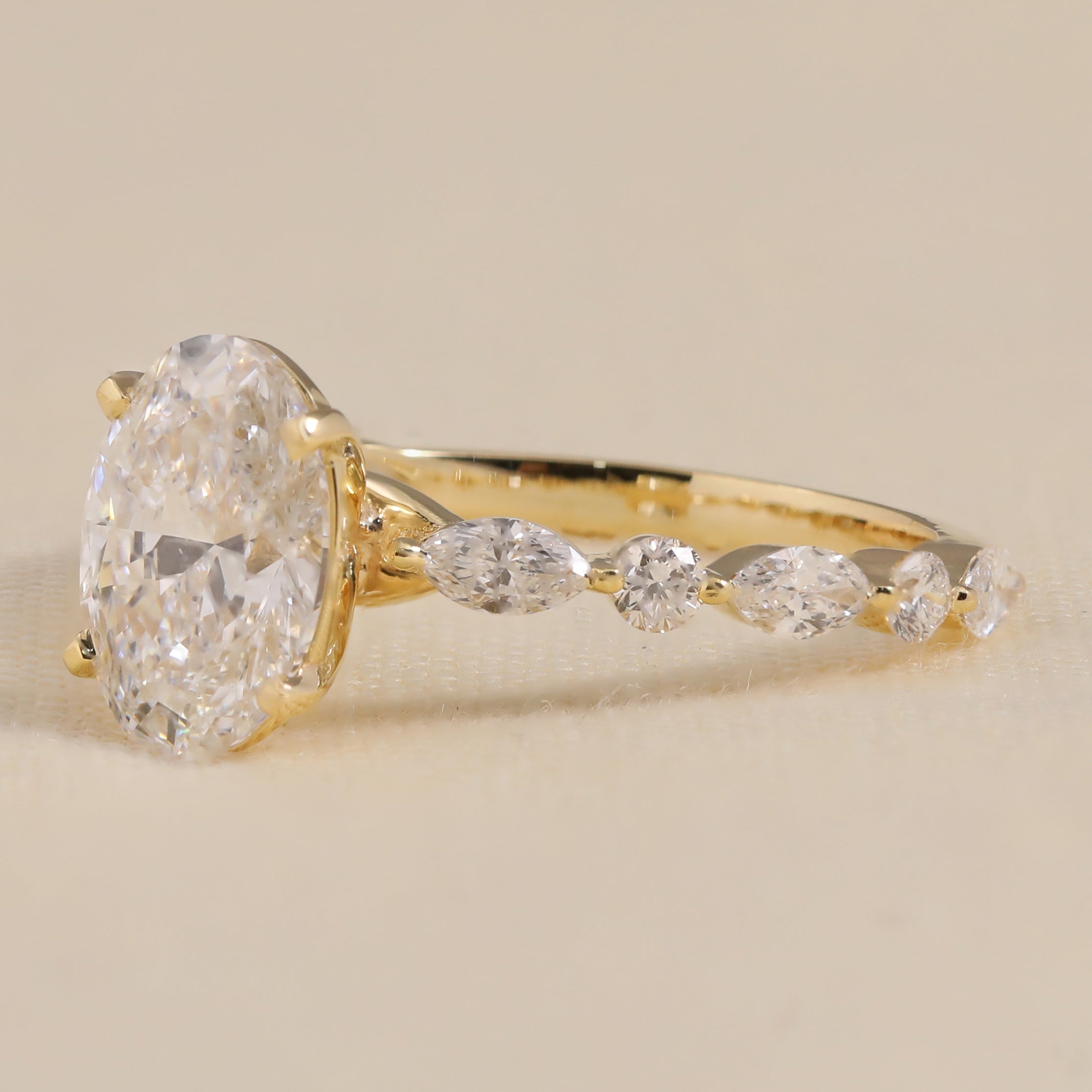 Oval cut lab diamond engagement ring with vintage style band design