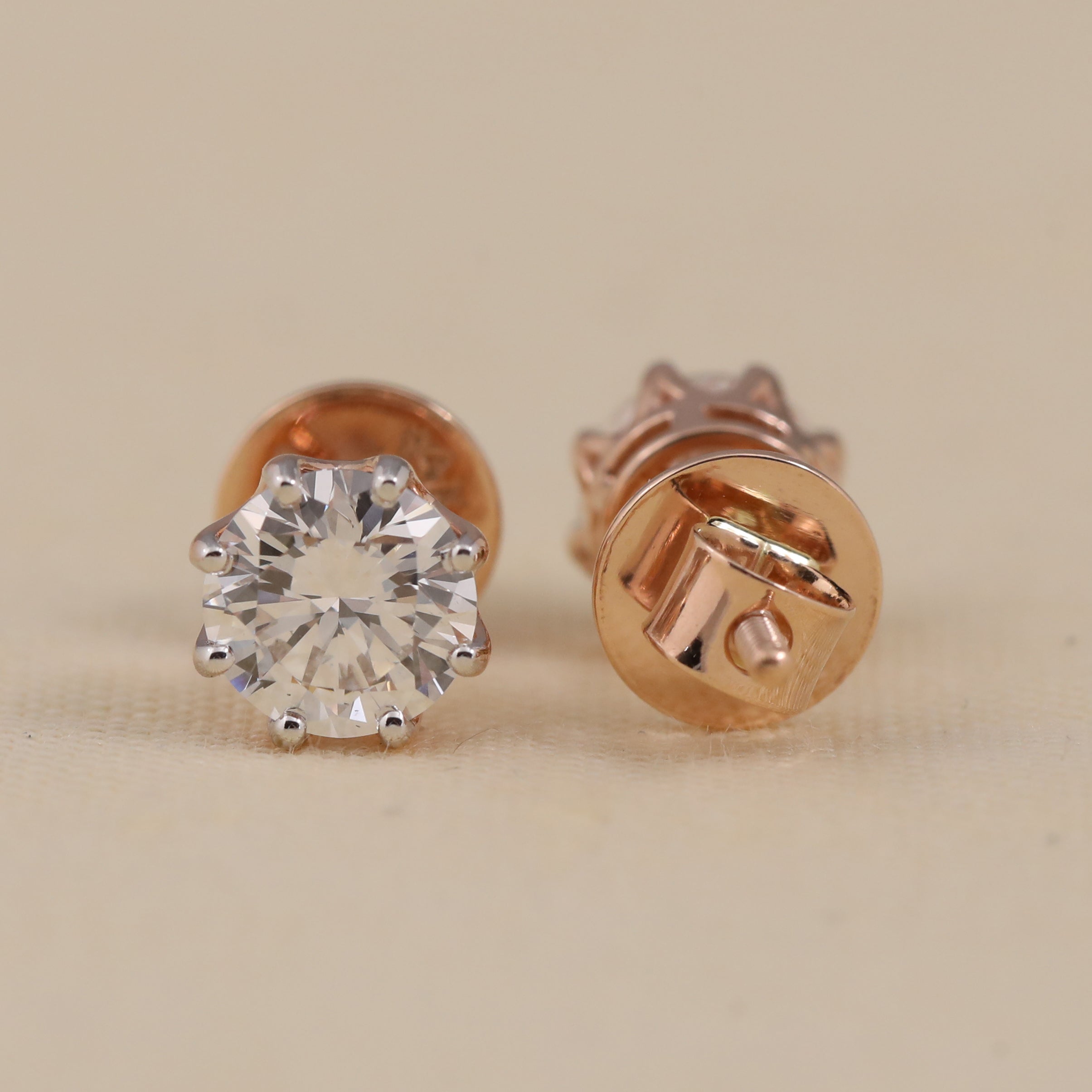 Classic round diamond stud earrings ideal for everyday wear or gifting