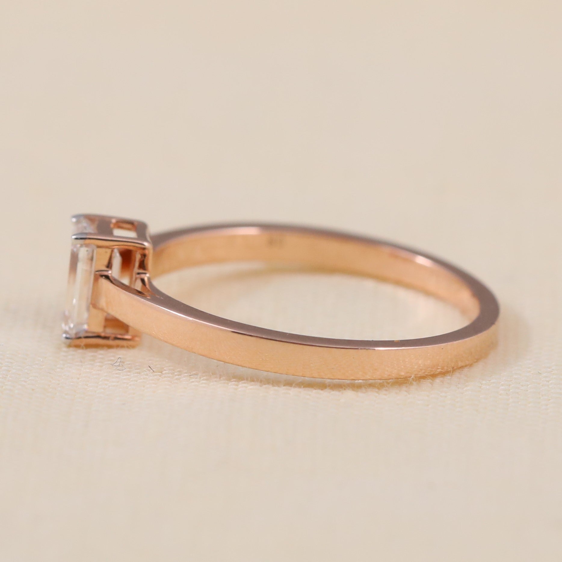 Timeless emerald cut lab grown diamond engagement ring with a slim modern band