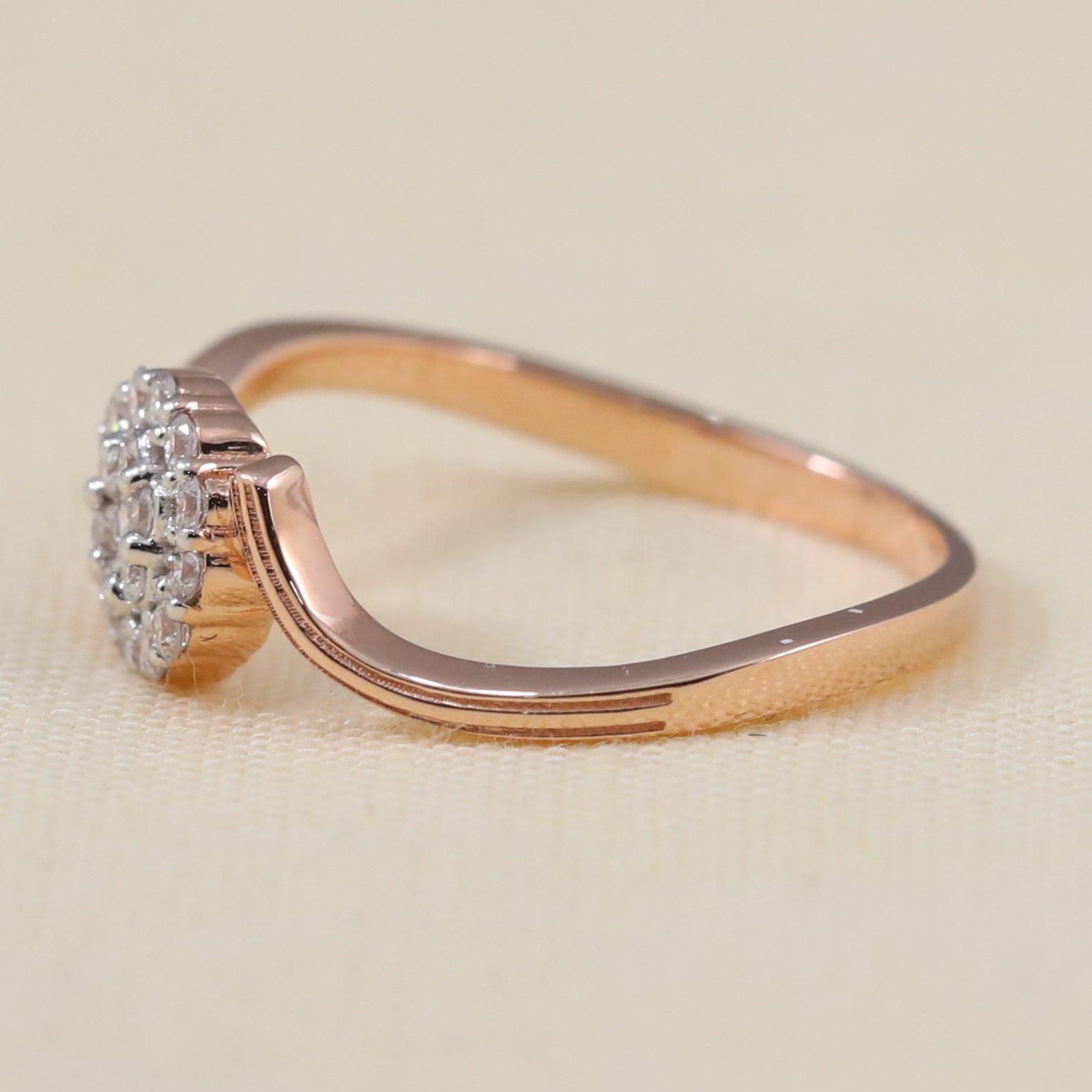 Elegant cluster lab grown diamond promise ring featuring a unique swirl design