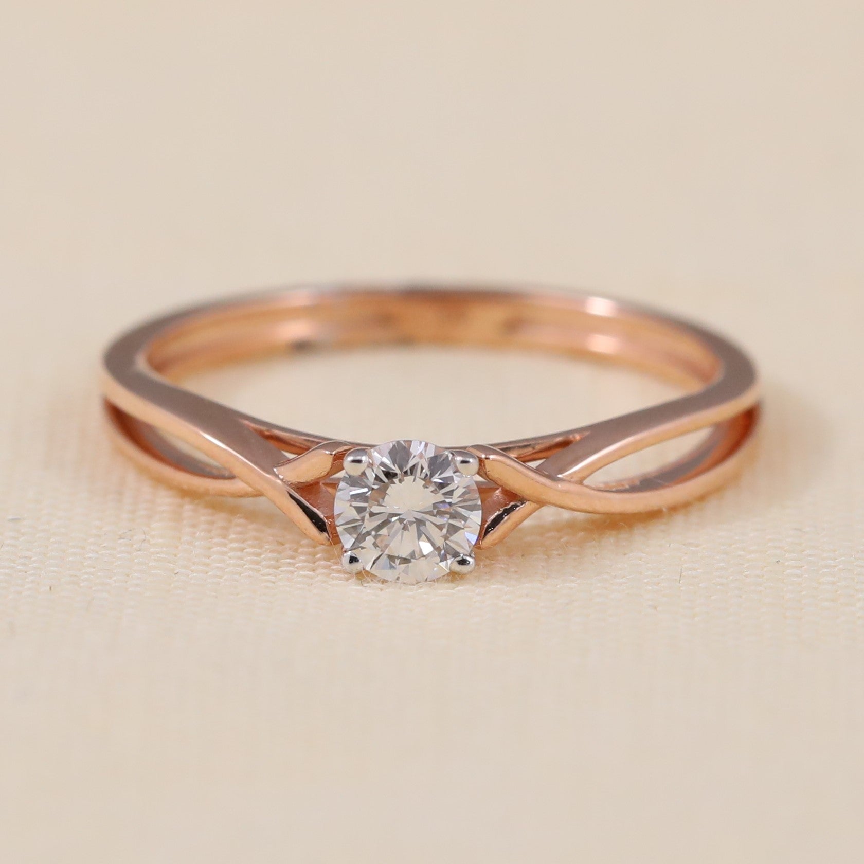 Round lab grown diamond solitaire ring featuring an elegant split band design