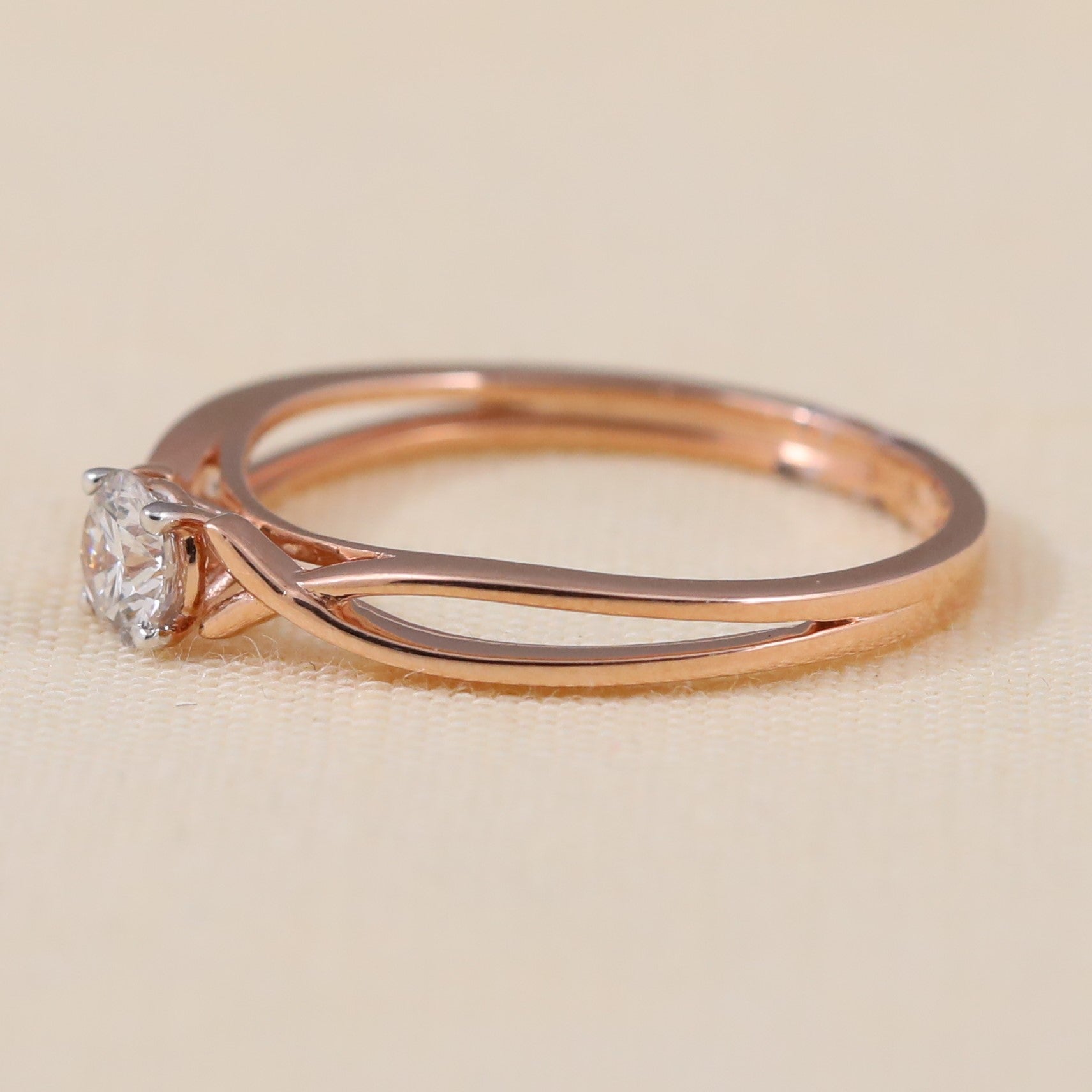 Delicate split band ring showcasing a brilliant round lab grown diamond