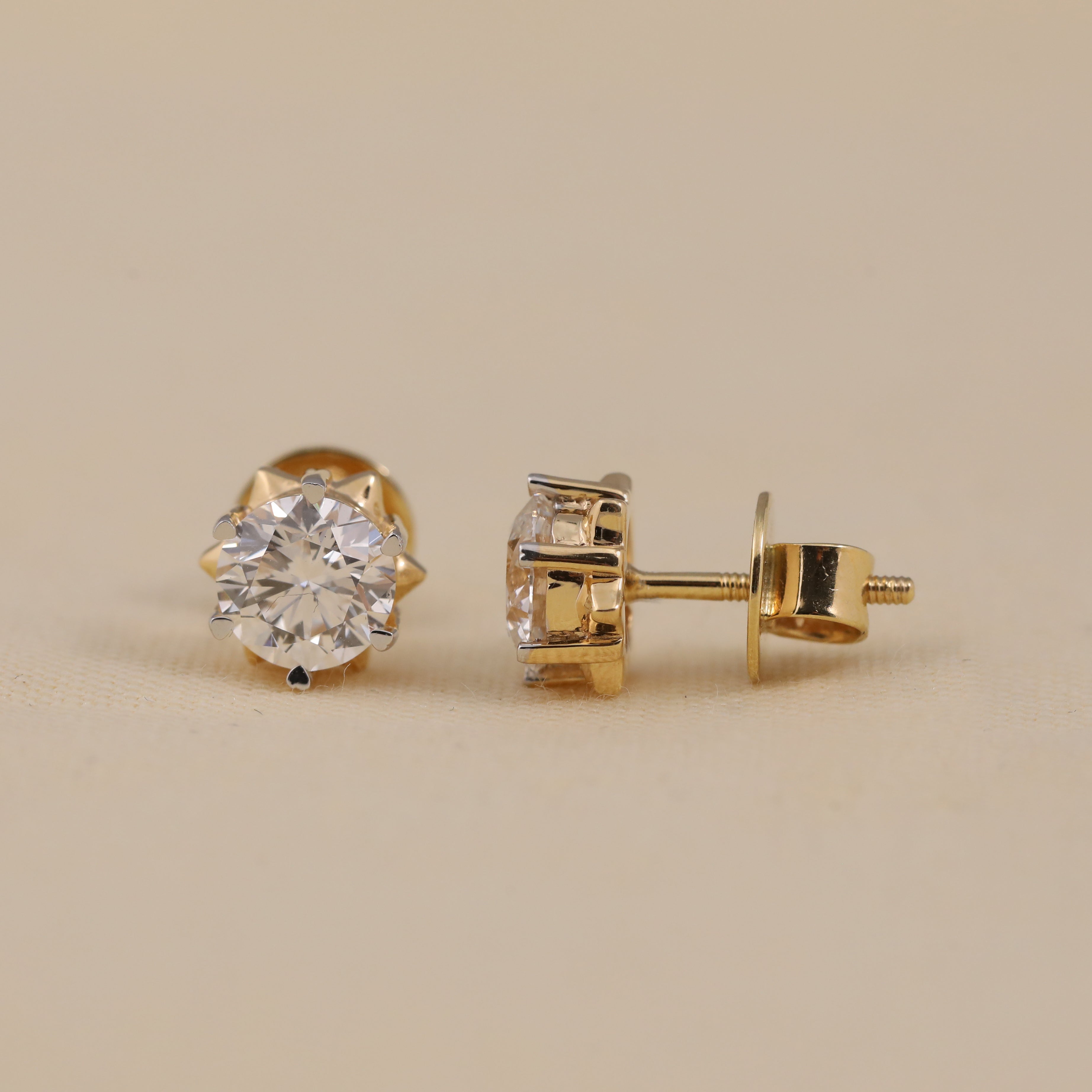 Brilliant solitaire diamond studs perfect for wedding events and celebrations.