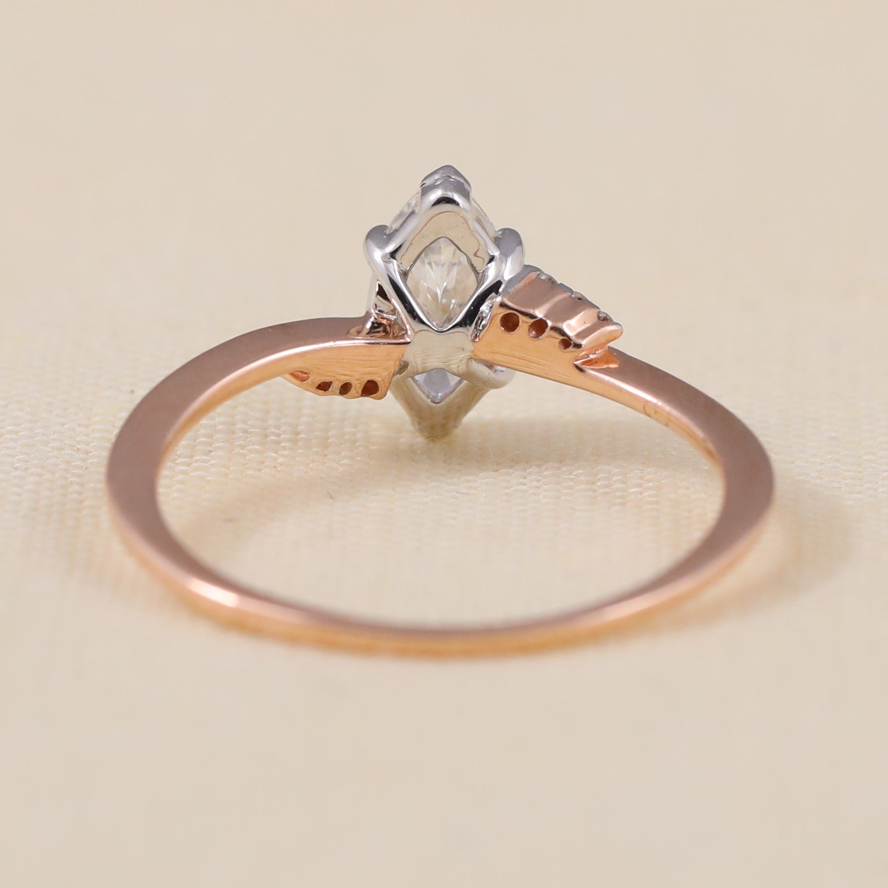 Modern engagement ring with marquise lab grown diamond and accent stones