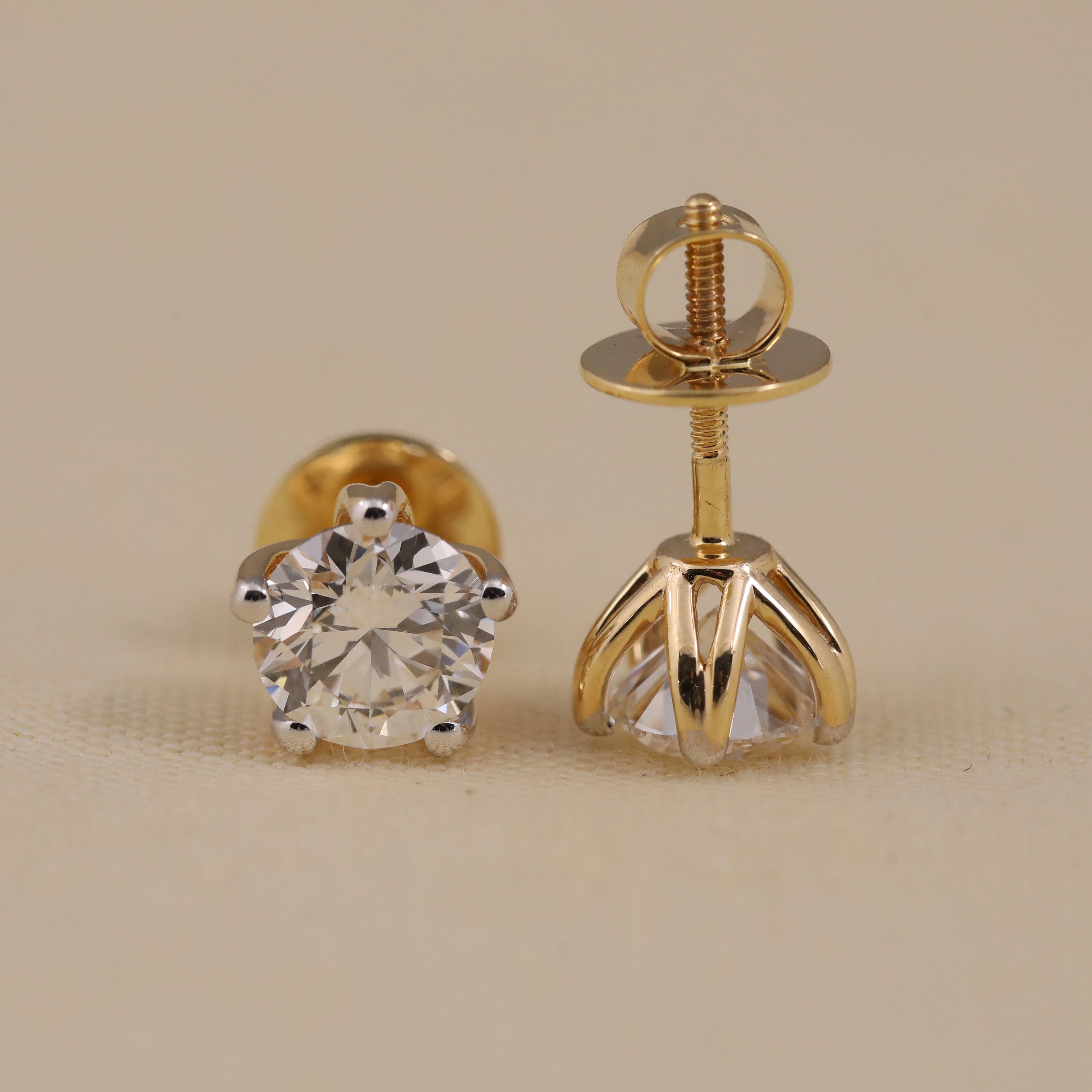 Classic round diamond earrings suited for birthday and wedding celebrations.
